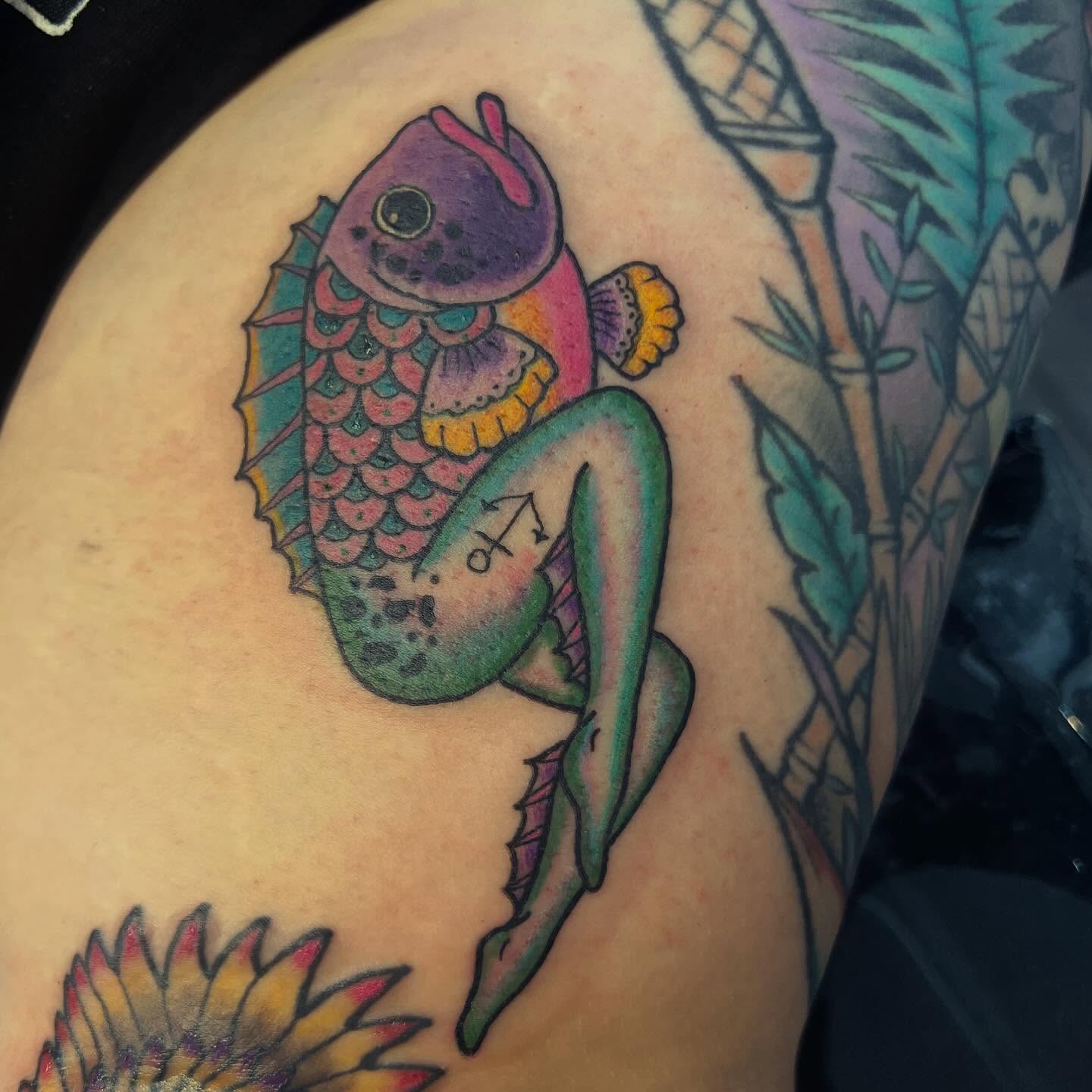 Fish American traditional tattoo on the thigh by Victorian Coleman