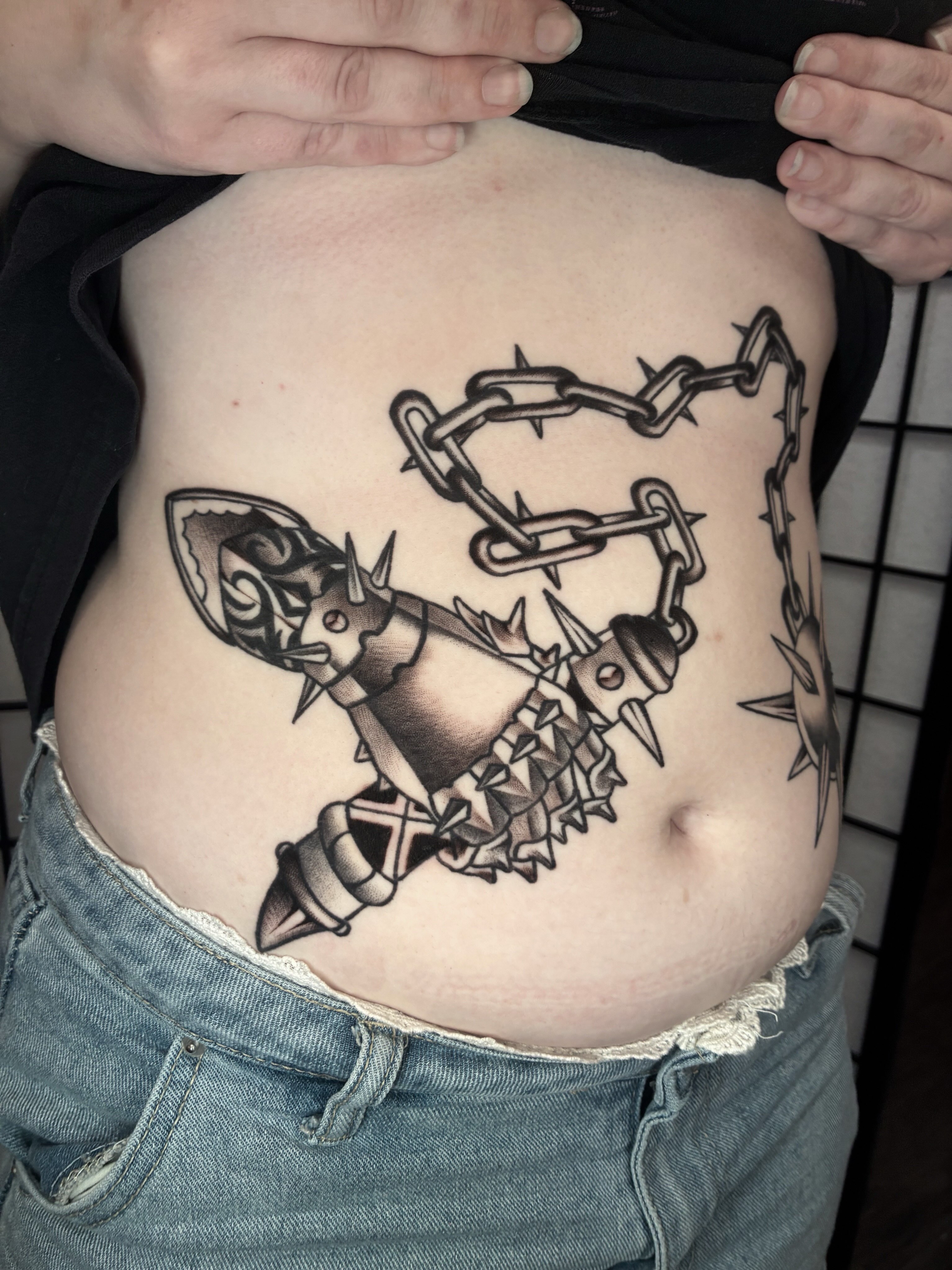 Barbed wire and spiked armor black and grey tattoo on the torso by ๐๐ช๐๐ซ๐ก๐ ๐๐ฏ๐ถ๐ฉ๐