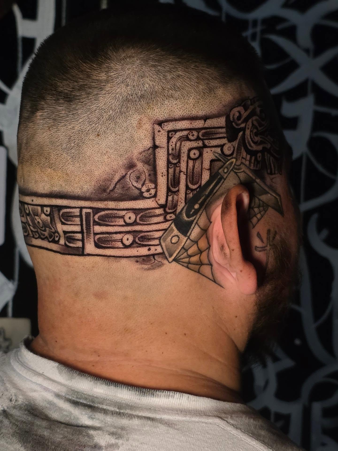 Geometric design geometric tattoo on the head by Tattoo Seez, Wichita, Kansas