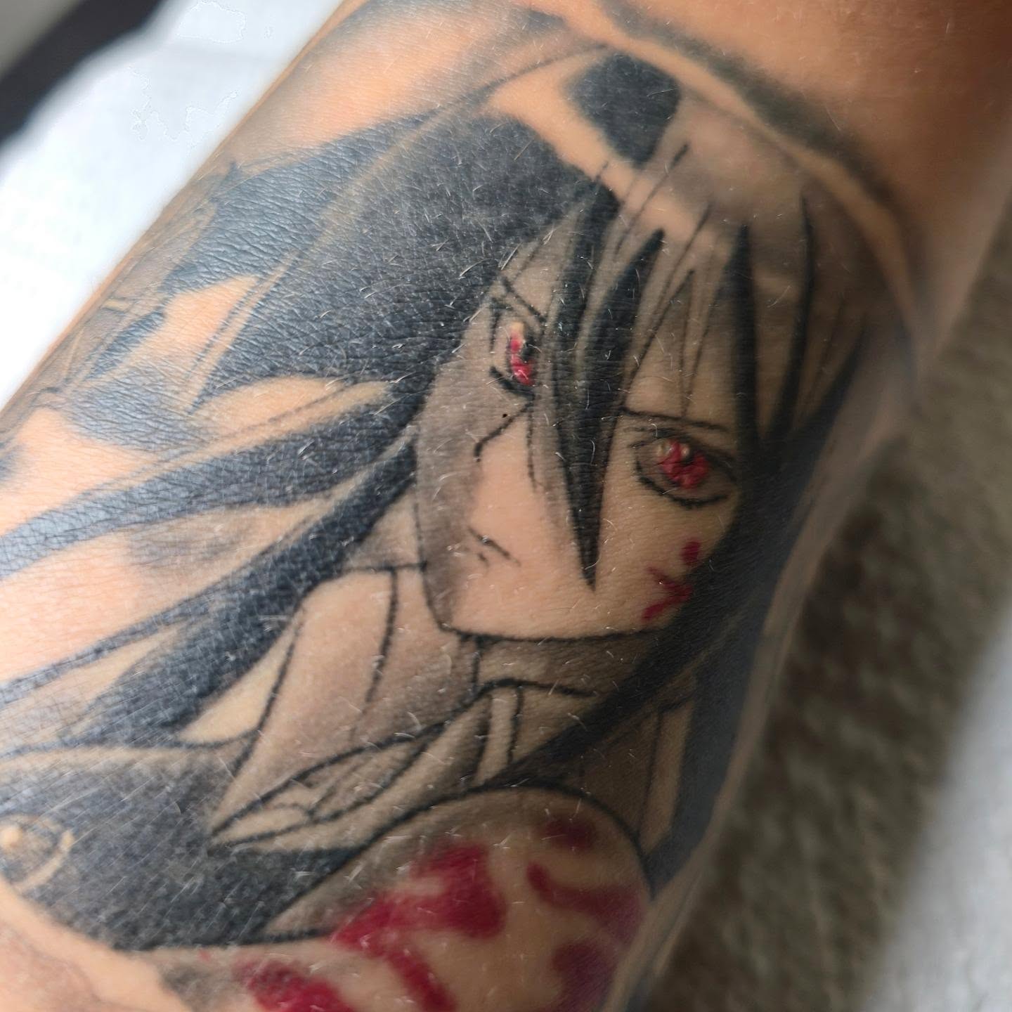 Anime character anime tattoo on the forearm by Tattoo Artist, Orange, California