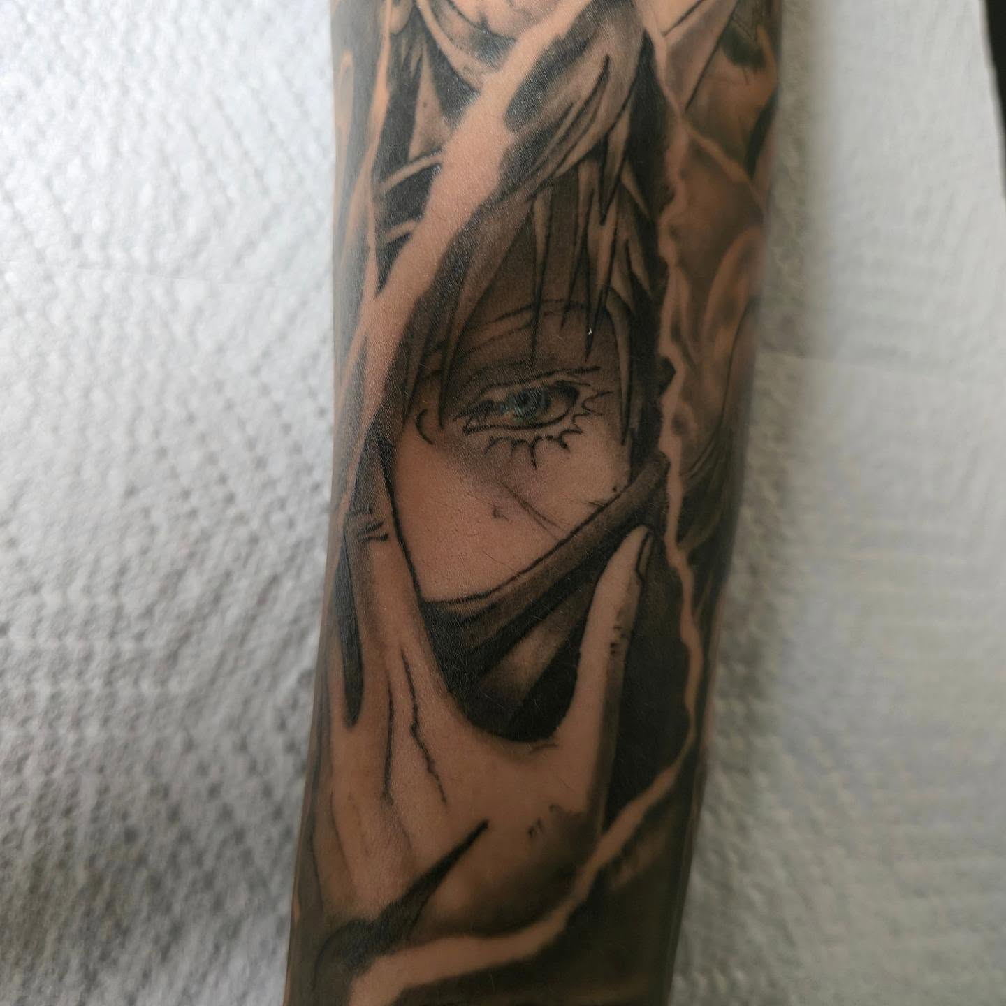 Anime character anime tattoo on the forearm by Tattoo Artist, Orange, California