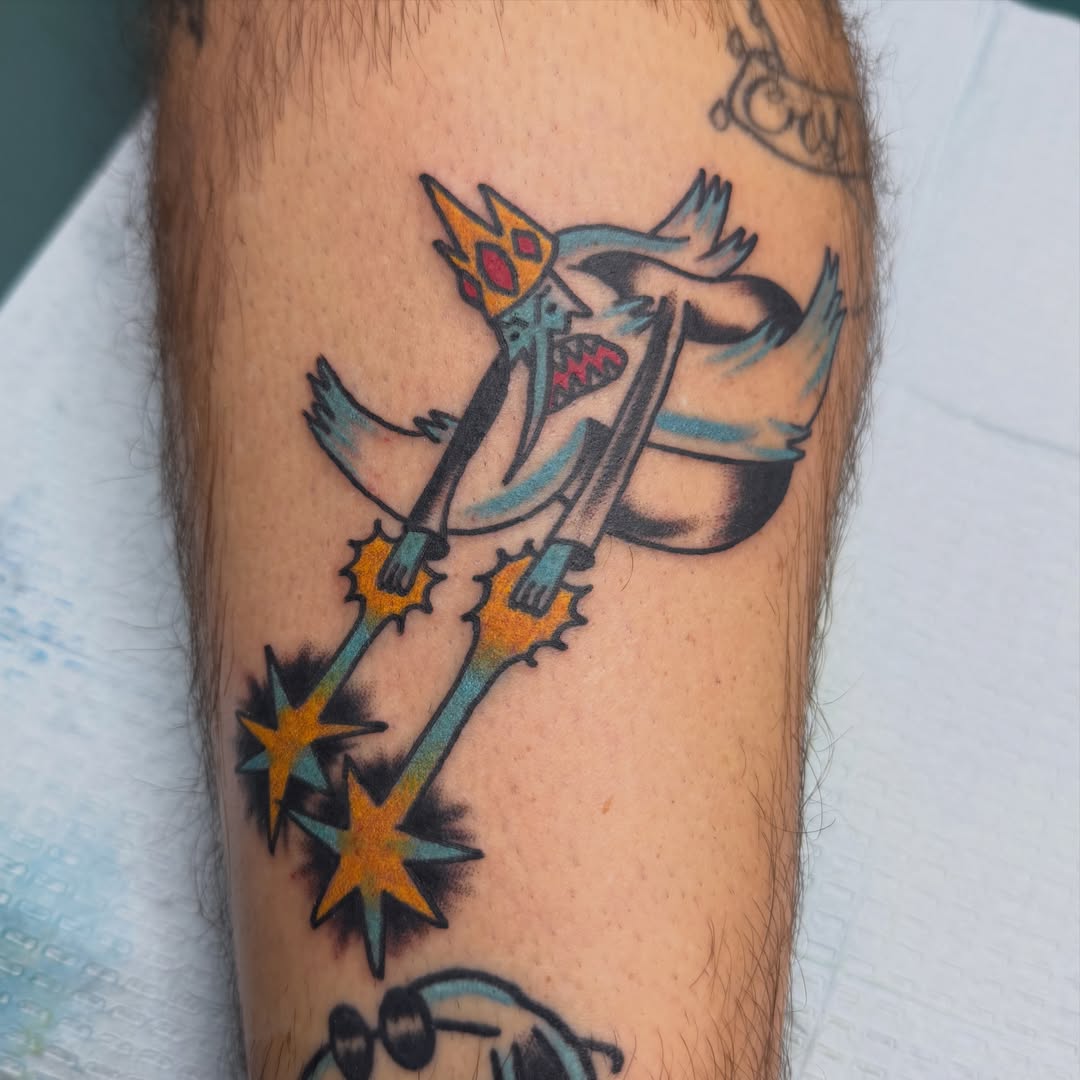 Bird with crown American traditional tattoo on the forearm by Carl Testi