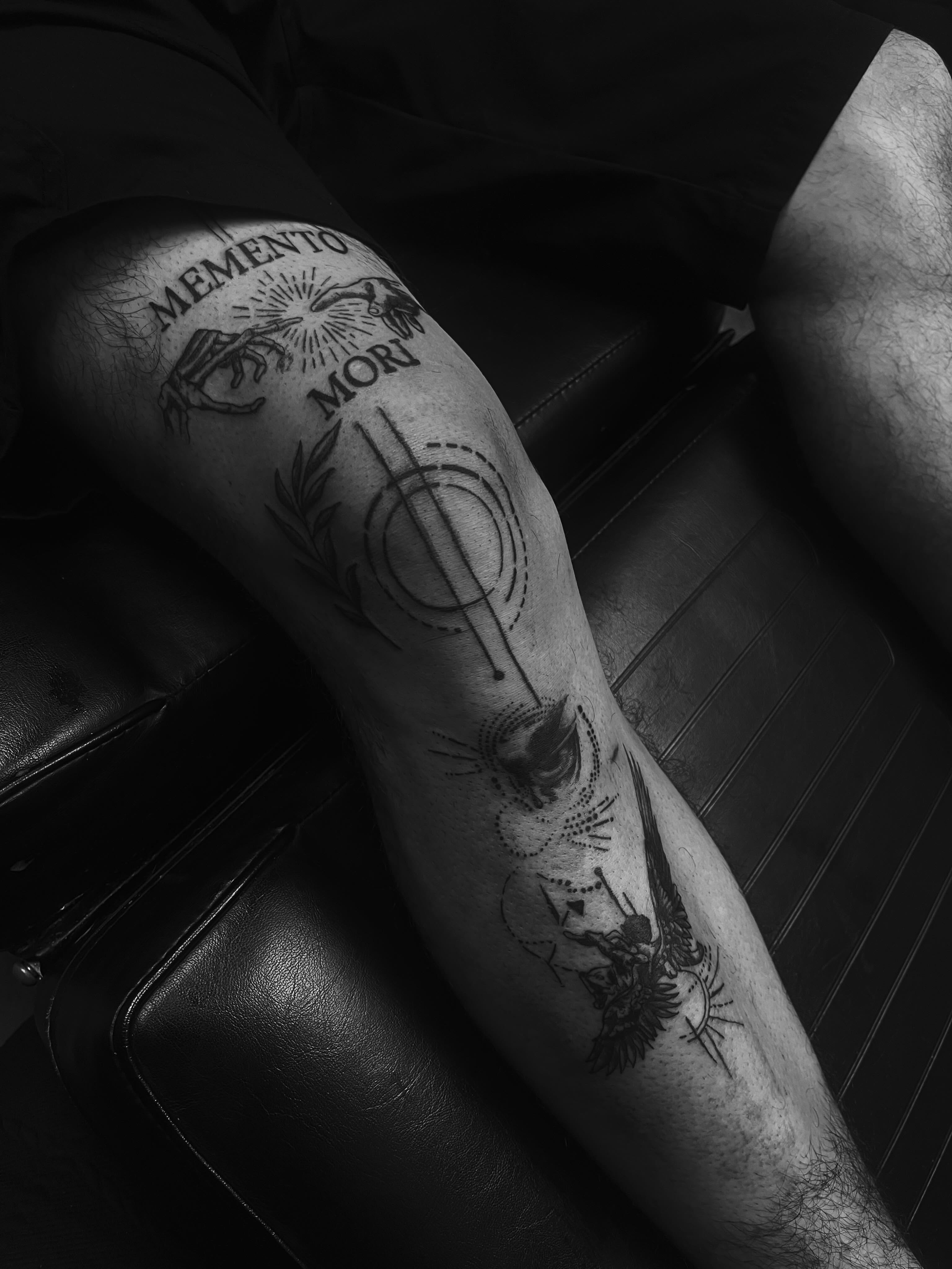 Memento mori black and grey tattoo on the forearm by Rico Rosario
