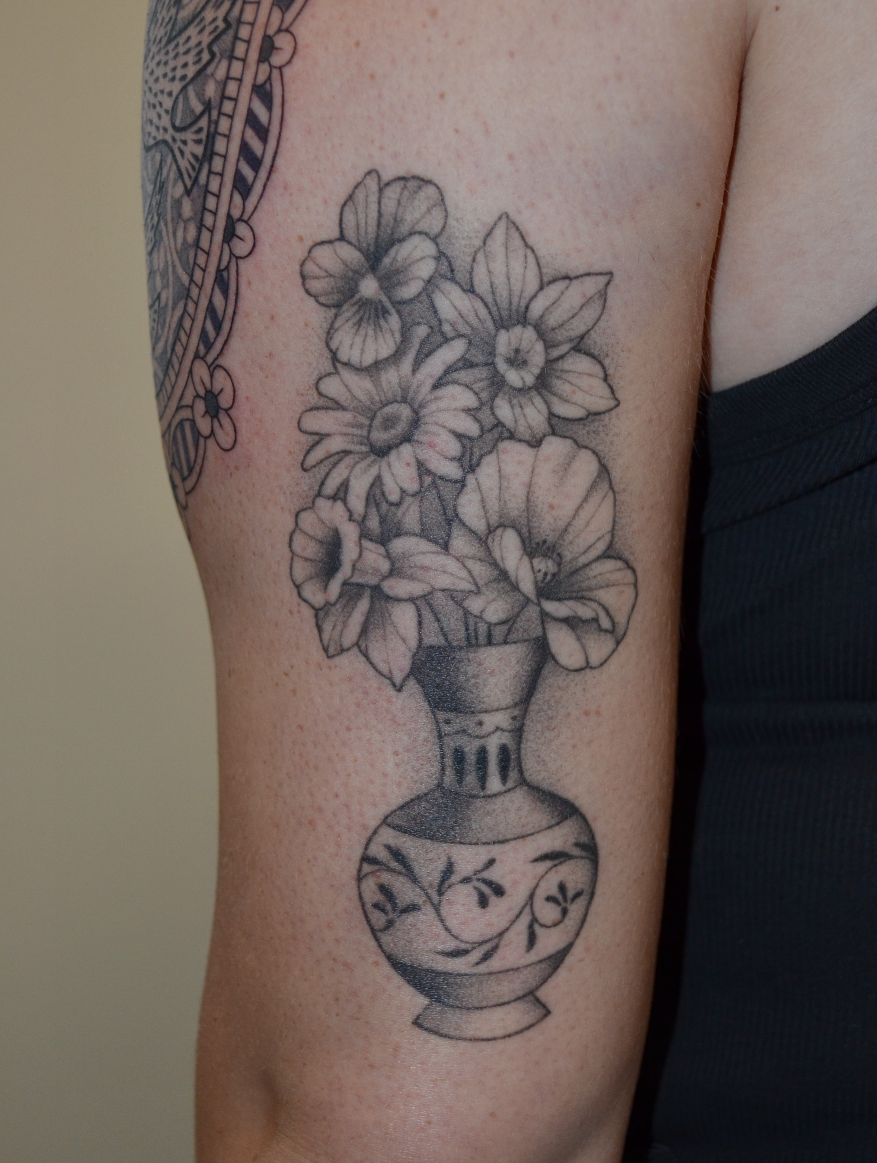 Flower bouquet dotwork tattoo on the forearm by Vanessa Acosta