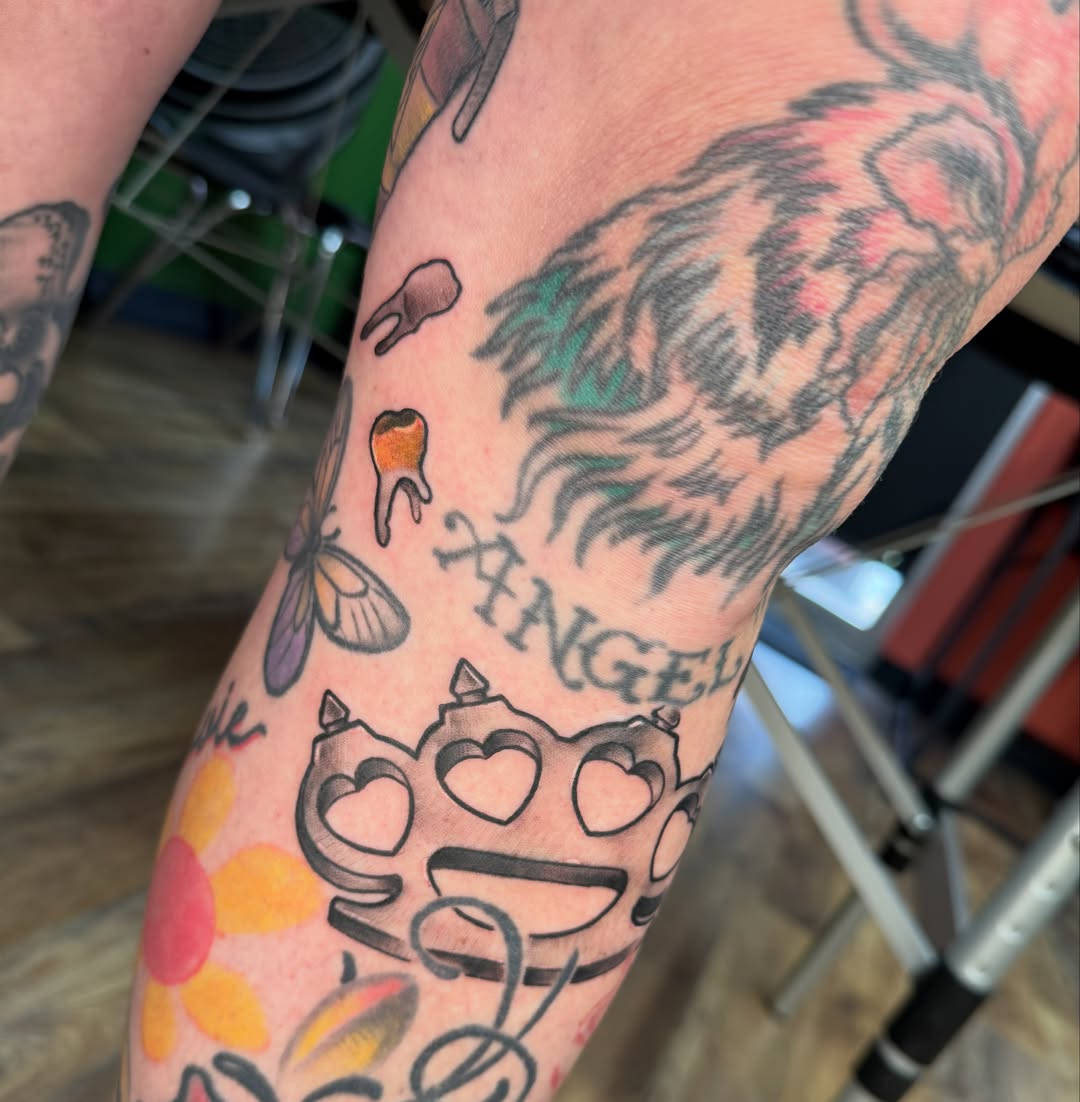 Crow and flower American traditional tattoo on the forearm by Josh Roberts, Franklin, Ohio