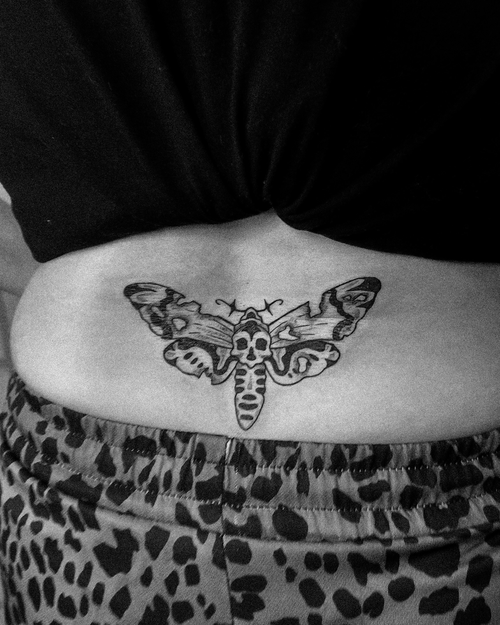 Moth with skull black and grey tattoo on the forearm by Morgan Diann