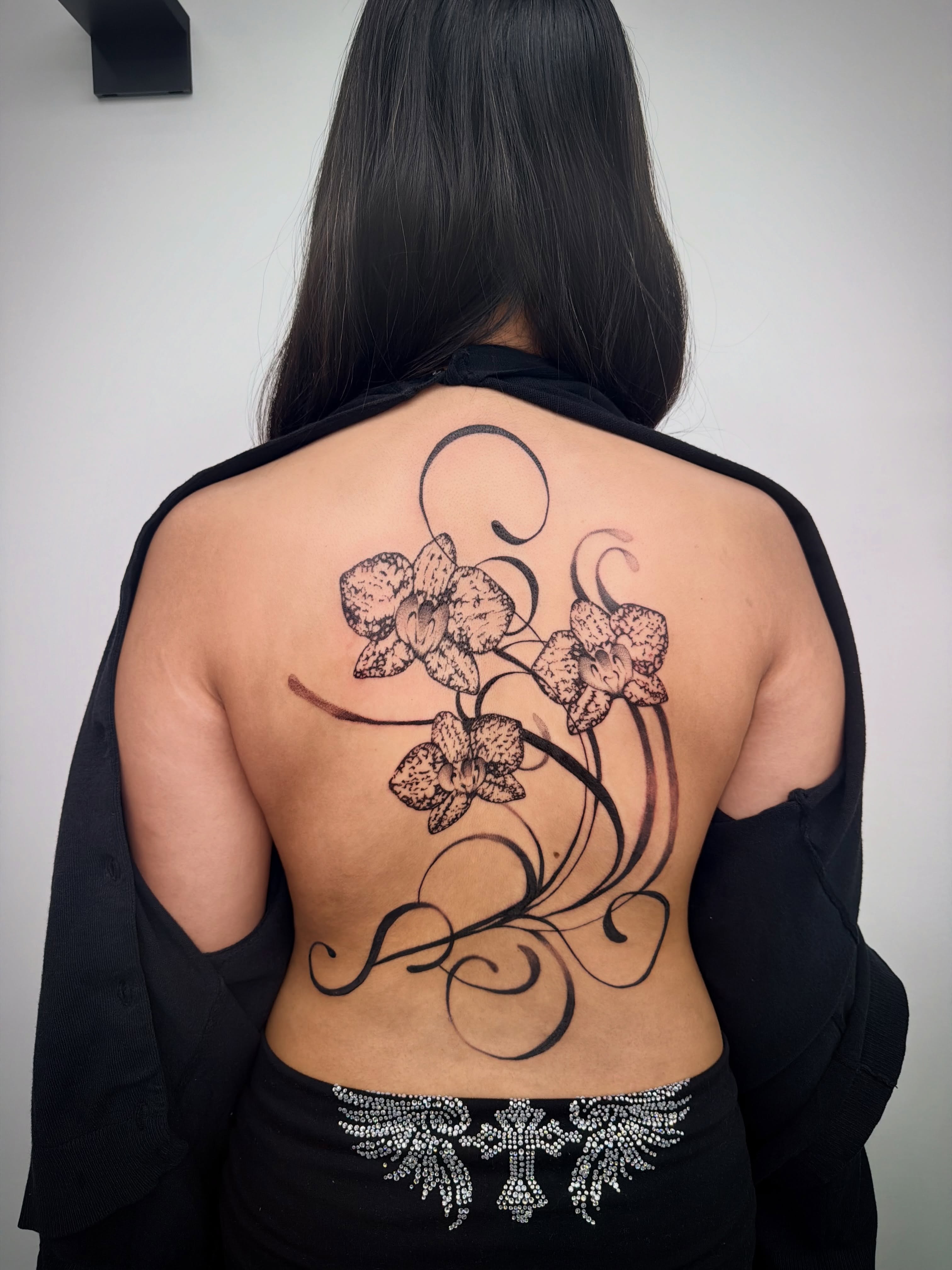 Orchids black and grey tattoo on the back by bella :)