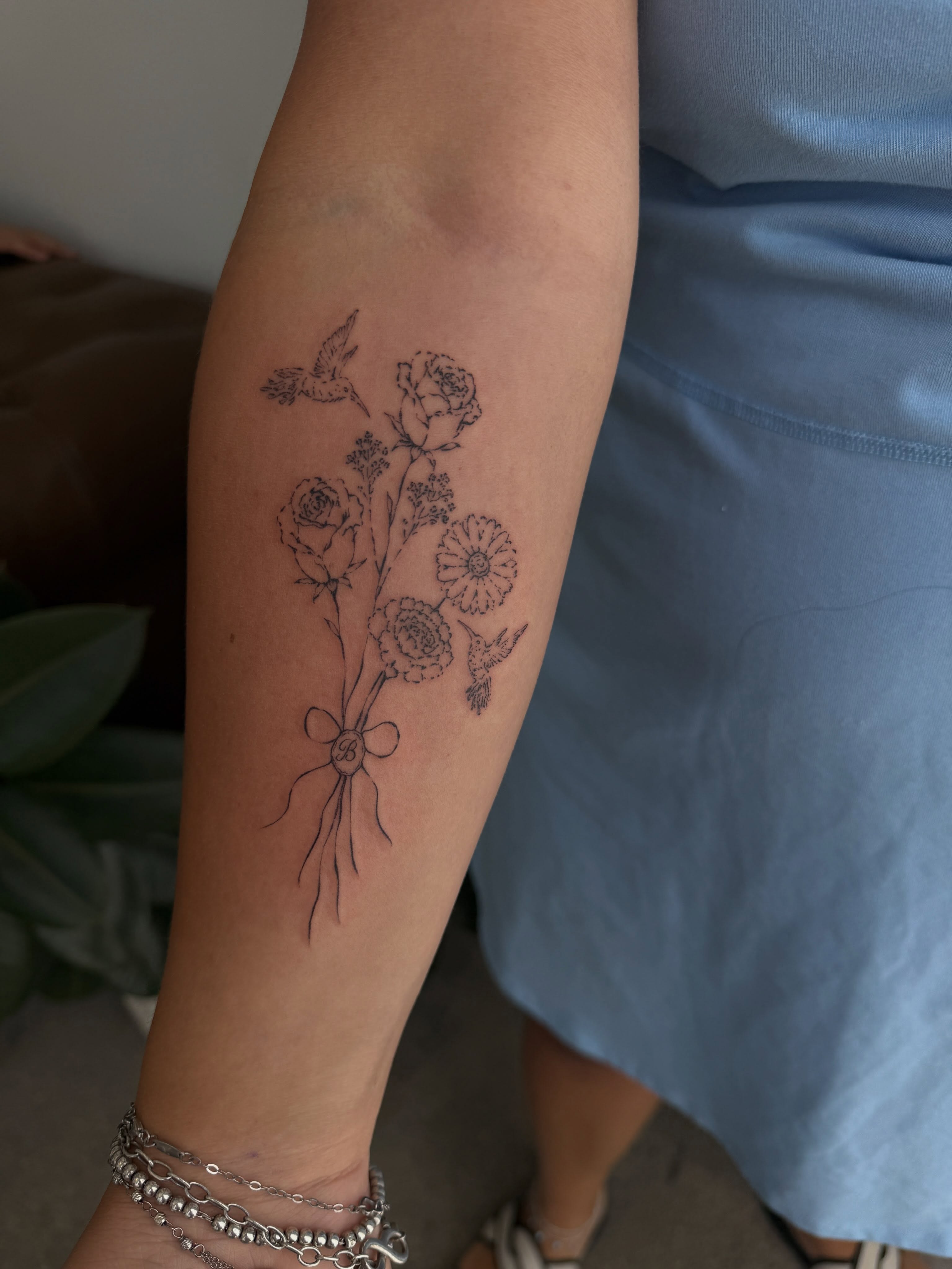 Flower bouquet dotwork tattoo on the forearm by π»ππ π
ππππ Tattoo Artist, Las Vegas, Nevada