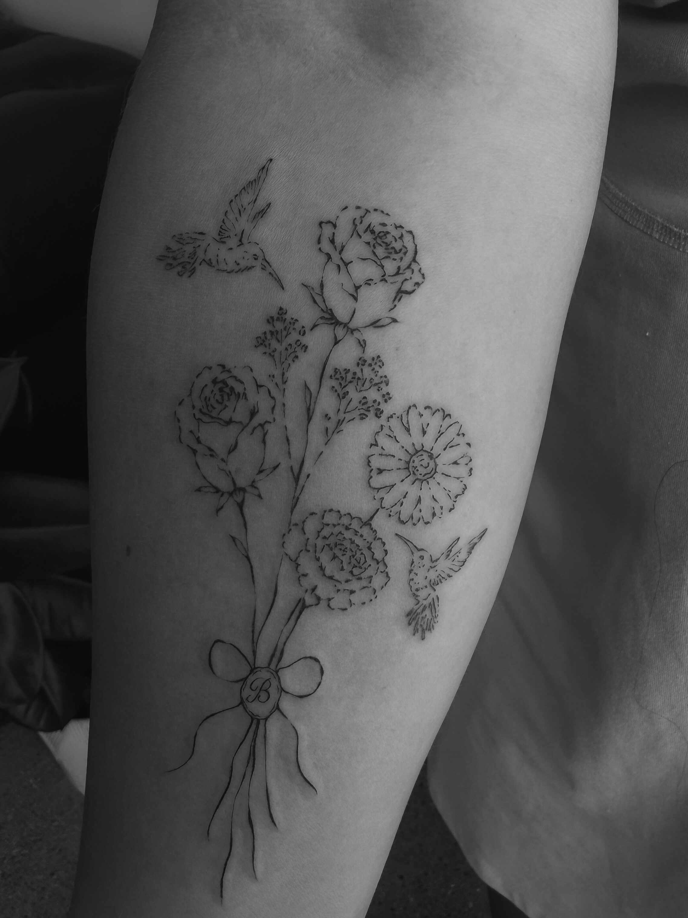 Flowers and hummingbirds black and grey tattoo on the forearm by π»ππ π
ππππ Tattoo Artist, Las Vegas, Nevada