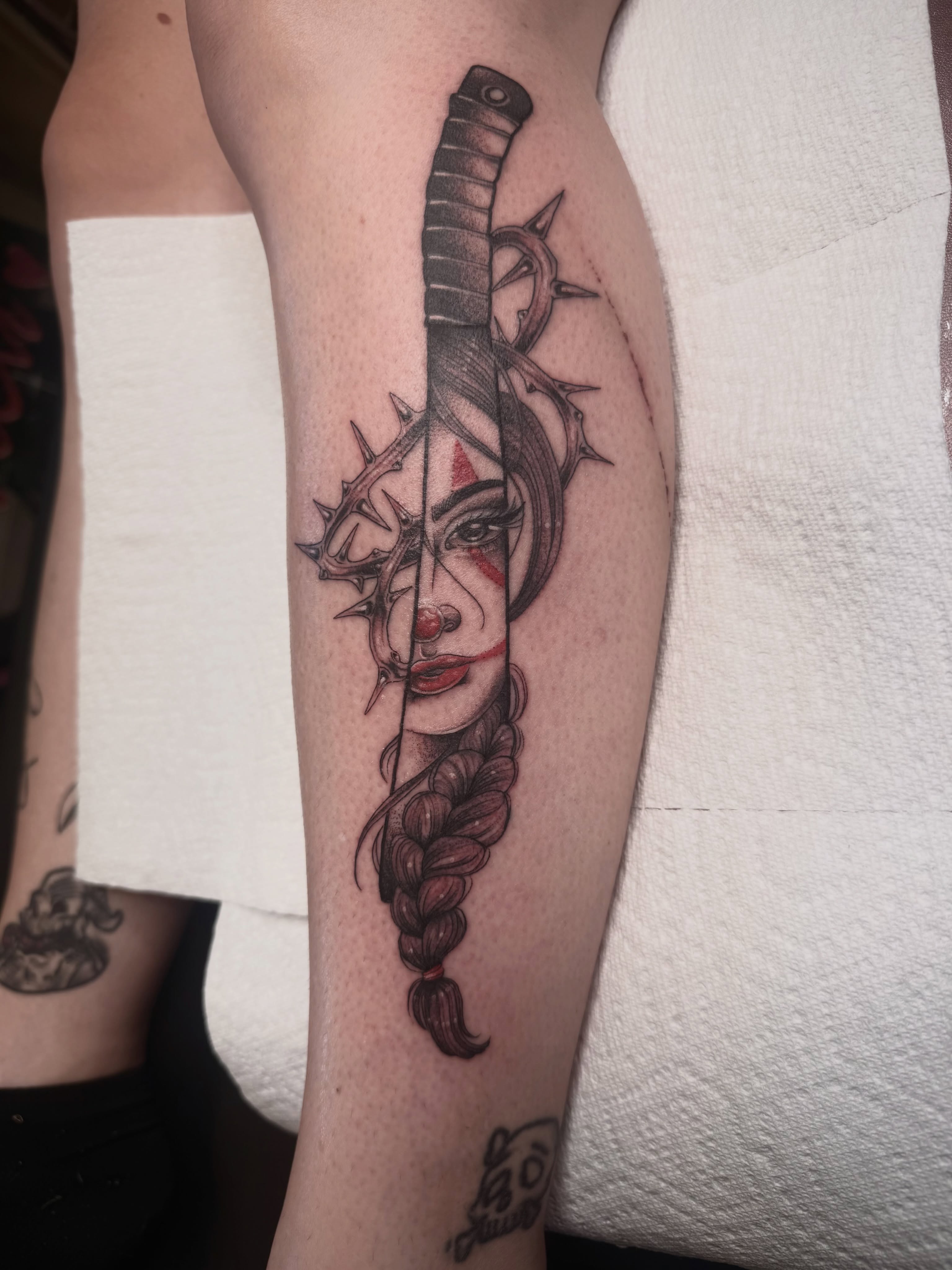 Woman and crown of thorns realism tattoo on the forearm by K9