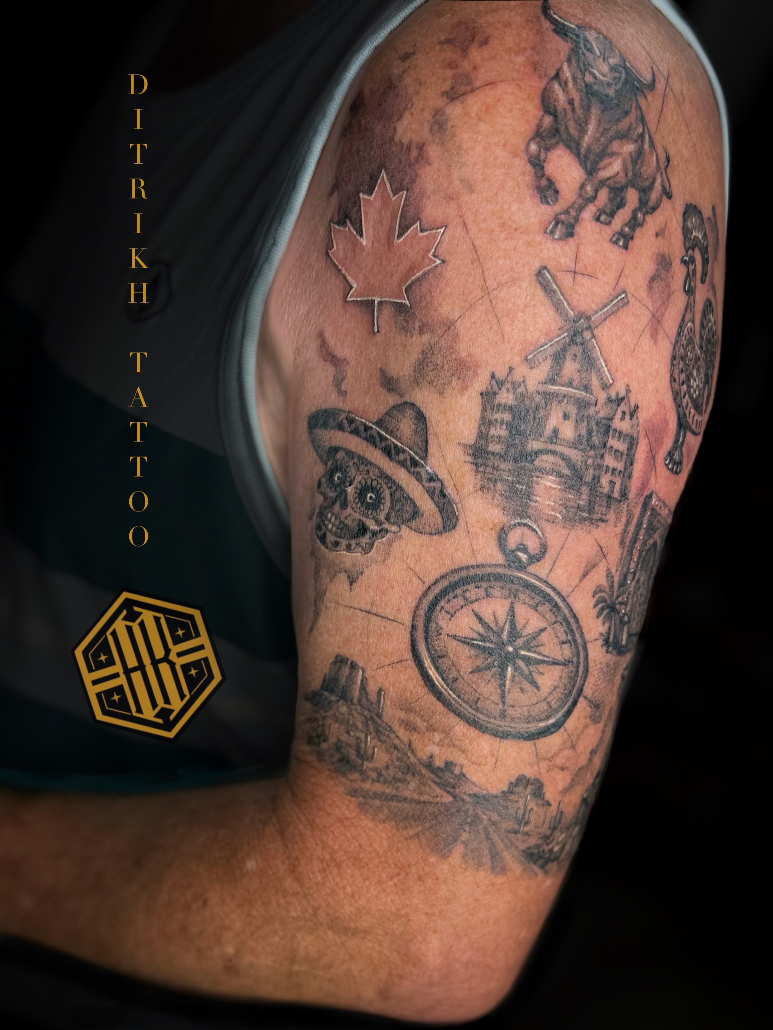 Travel-themed symbols realism tattoo on the upper arm by KET, Calgary, Alberta