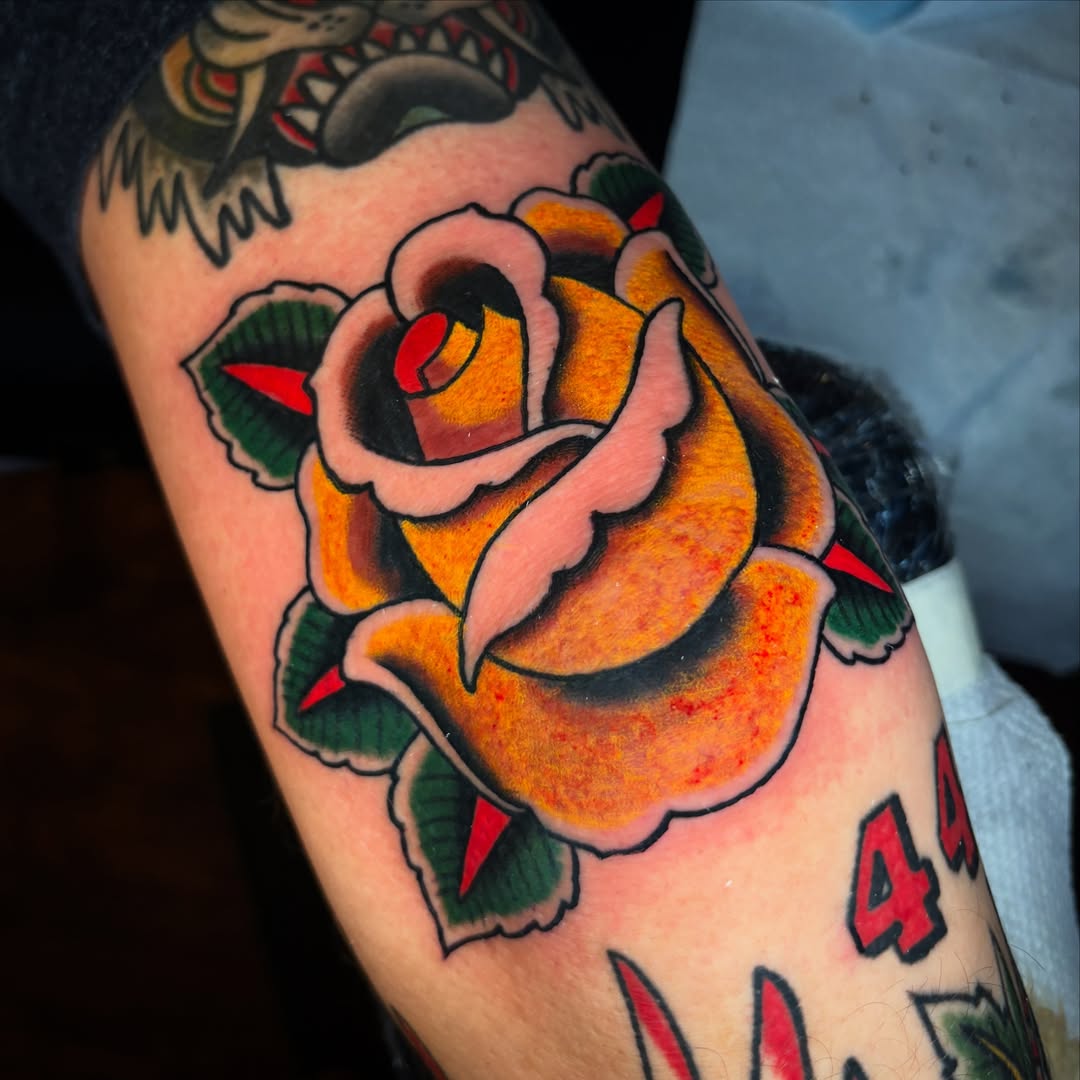 Rose American traditional tattoo on the forearm by Max Klapp, Austin, Texas