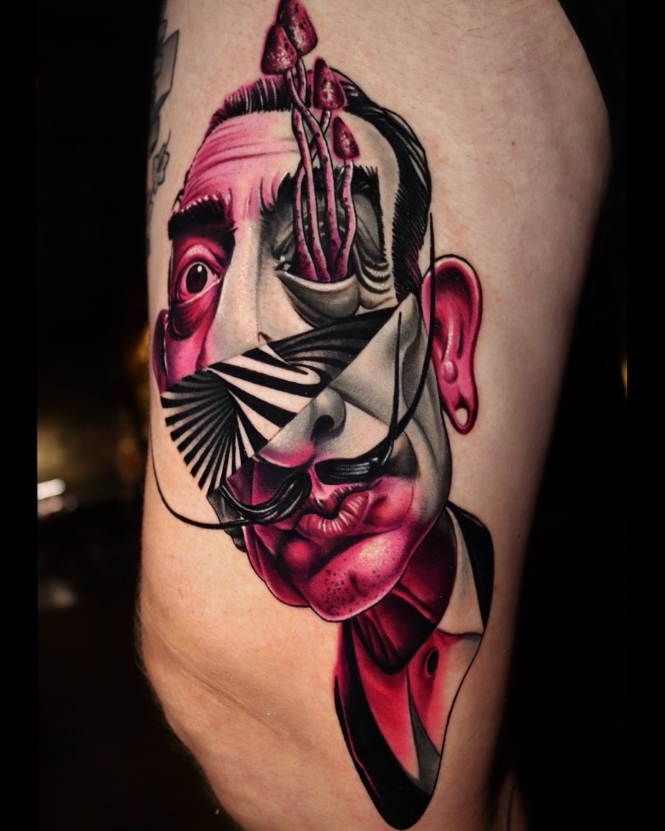 Abstract face geometric tattoo on the thigh by Gary Barrera