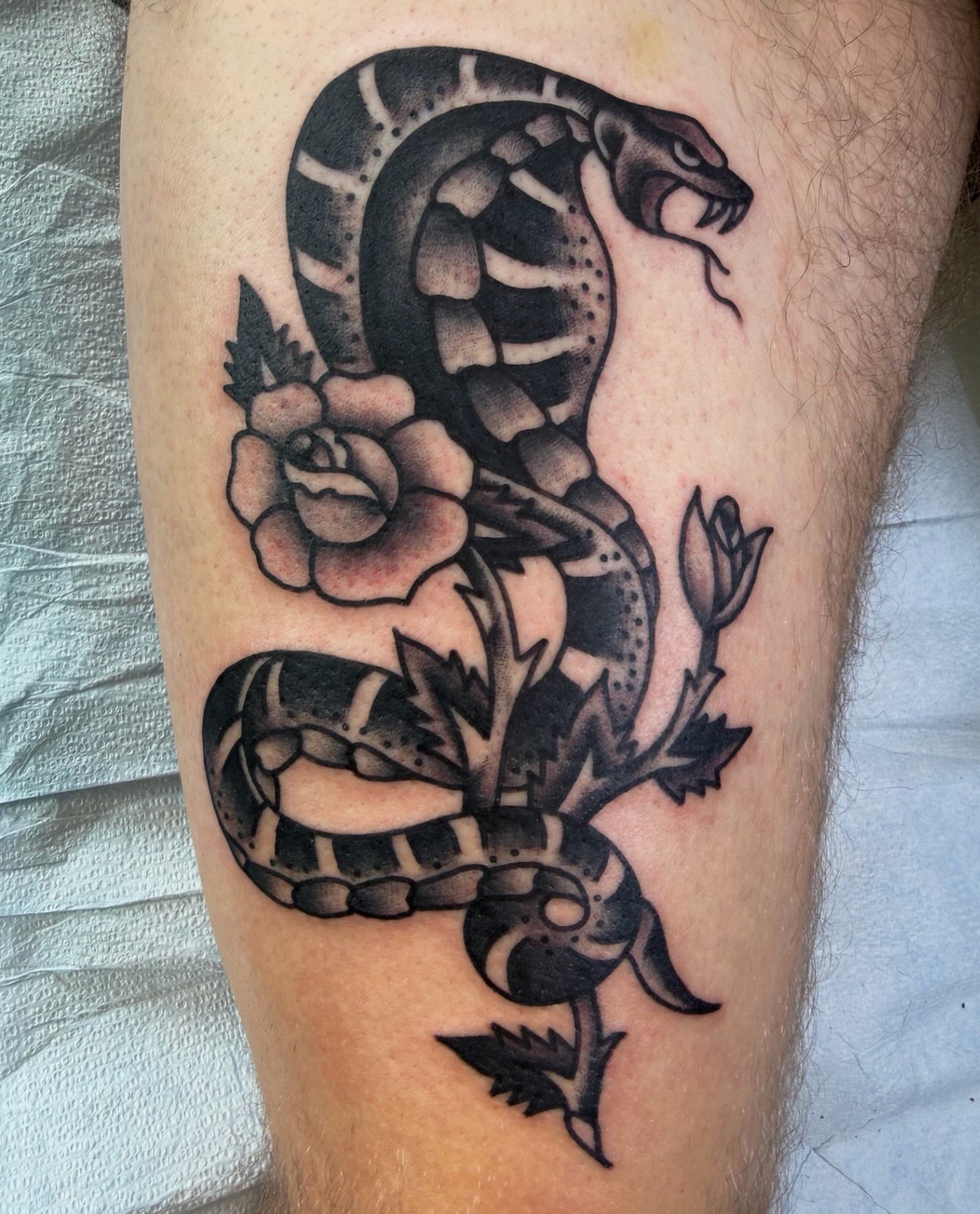 Tattoo by @daviddevaney_ — american_traditional, black_and_grey