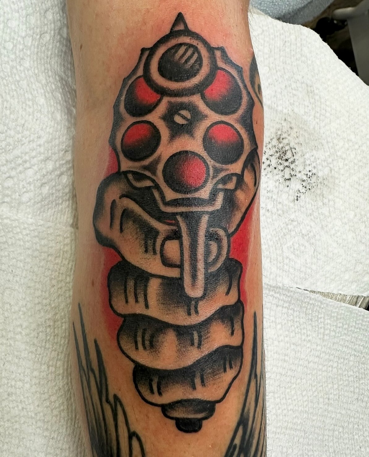 Grenade American traditional tattoo on the forearm by David Devaney, Knoxville, Tennessee