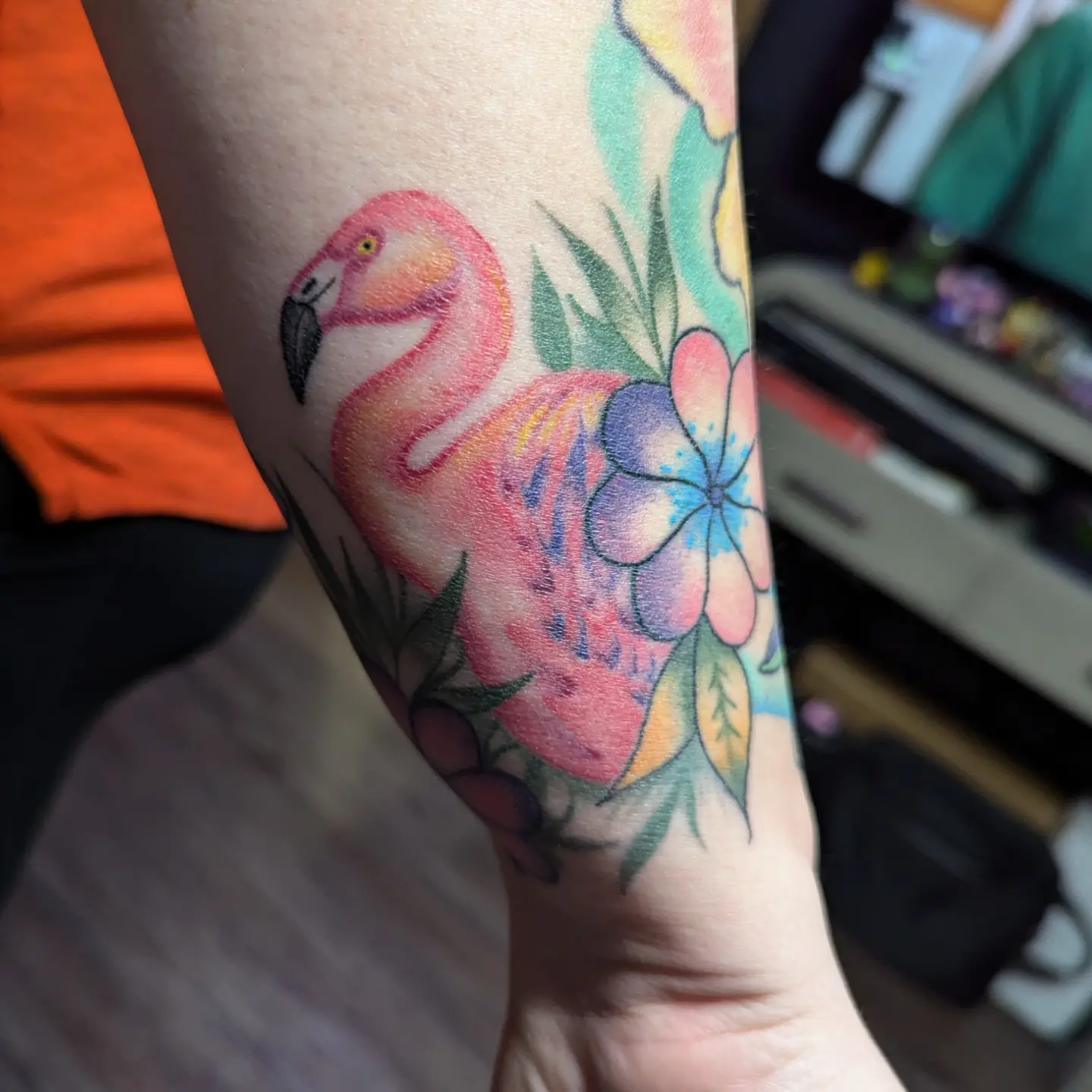 Flamingo and flowers watercolor tattoo on the forearm by 𝐈𝐚𝐧 𝐒𝐞𝐭𝐡 🕷️ Austin