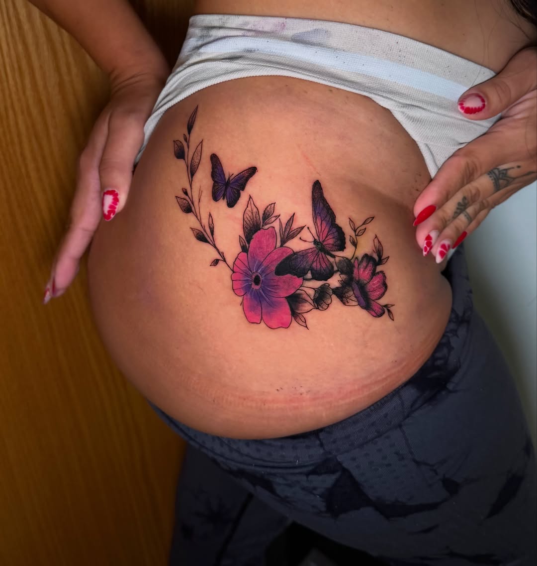 Flowers and butterflies new school tattoo on the torso by Sebastian martinez, Memphis, Tennessee