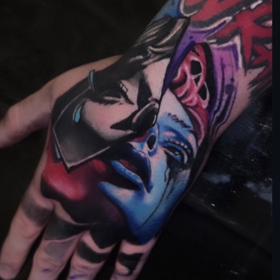 Anime character anime tattoo on the hand by Donald Reynolds