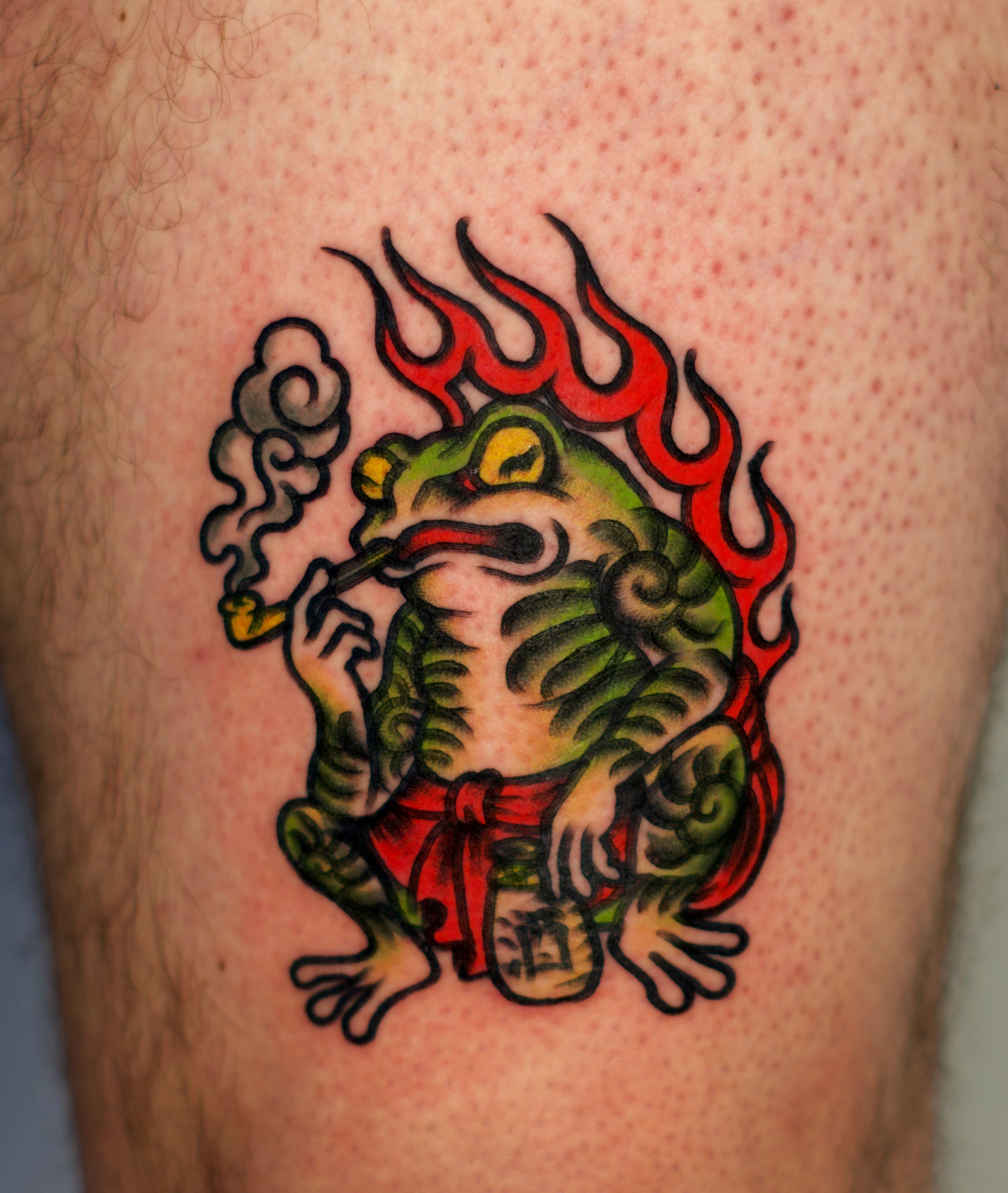 Frog American traditional tattoo on the thigh by Tattooer Sancho 🇰🇷🇨🇦