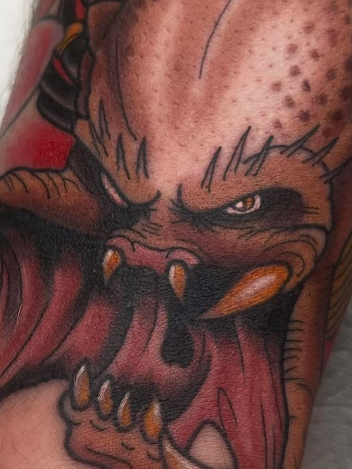 Predator dark realism tattoo on the forearm by Tyler Harrington
