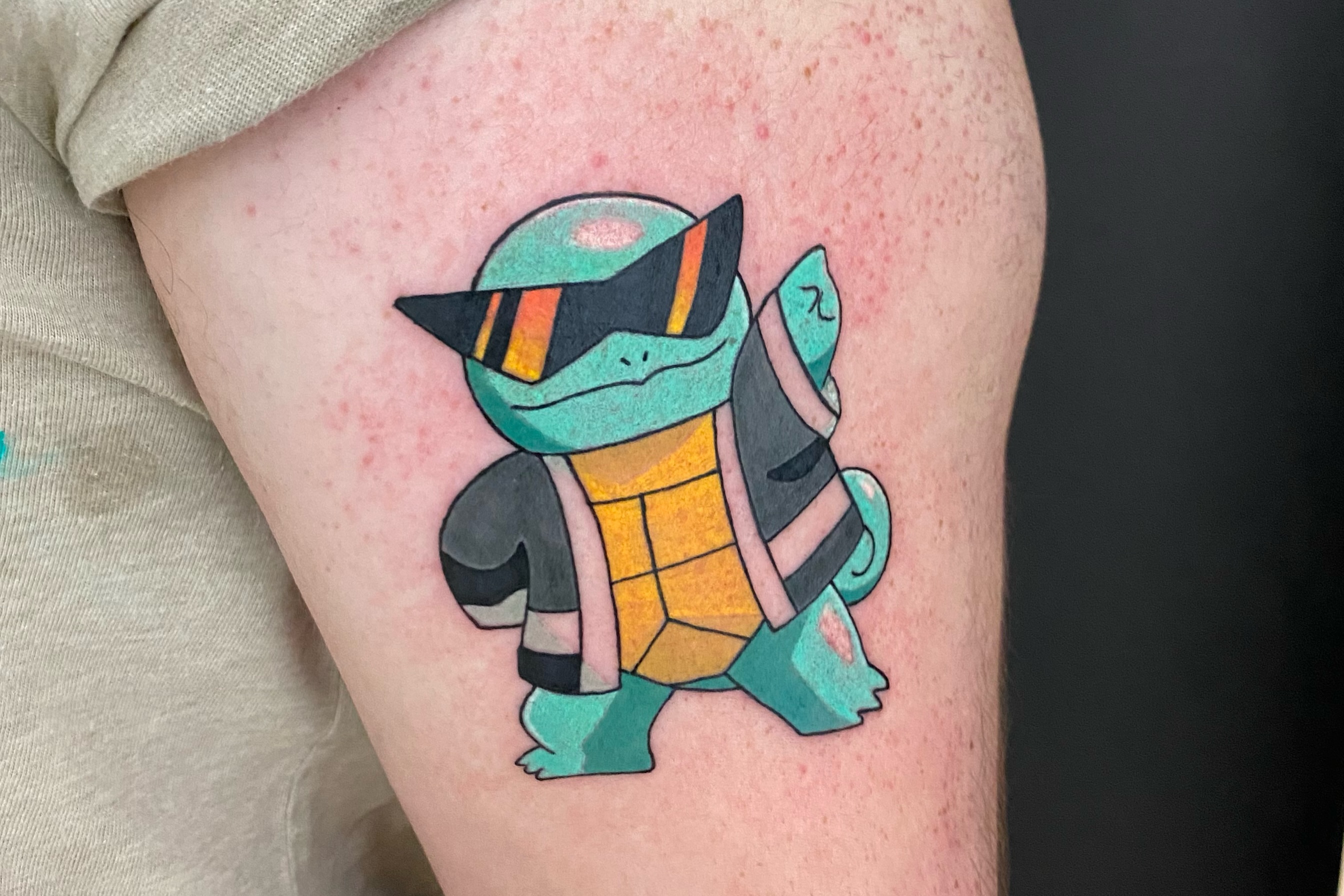 Squirtle new school tattoo on the thigh by Alfred