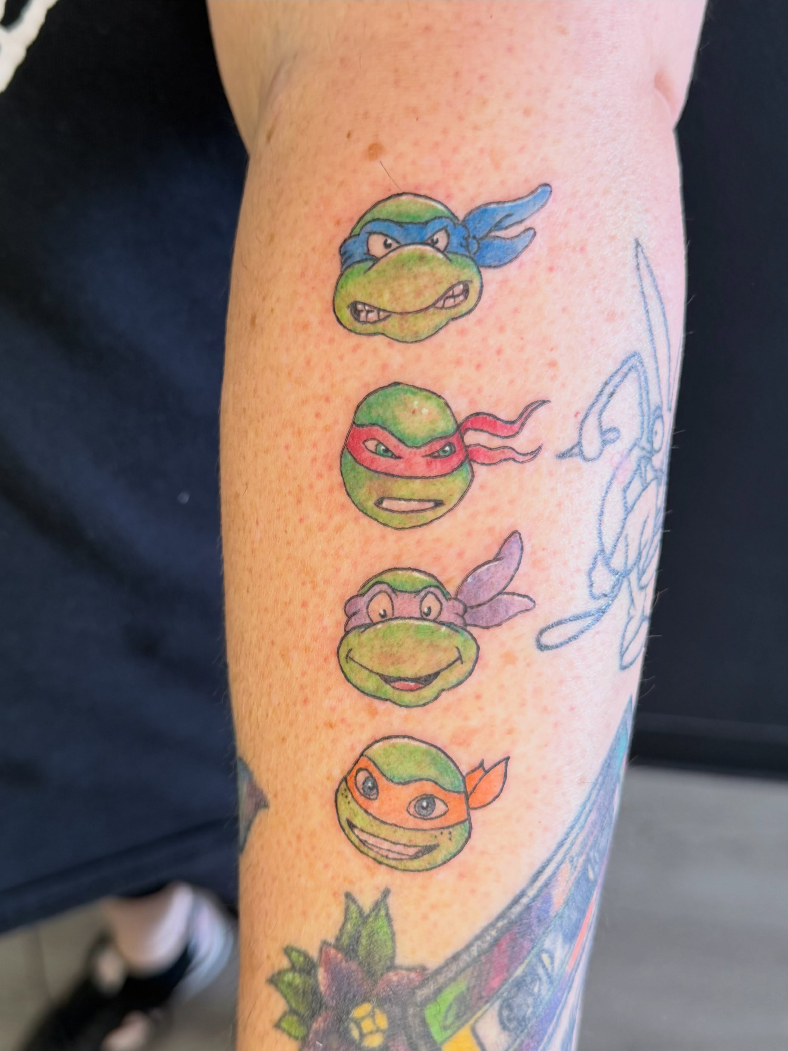 Teenage Mutant Ninja Turtles new school tattoo on the forearm by LooSid