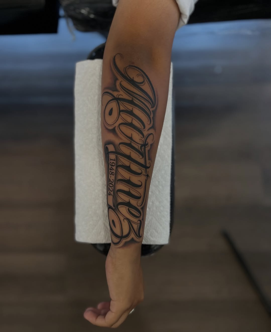Script lettering lettering script tattoo on the forearm by Tattoo Artist