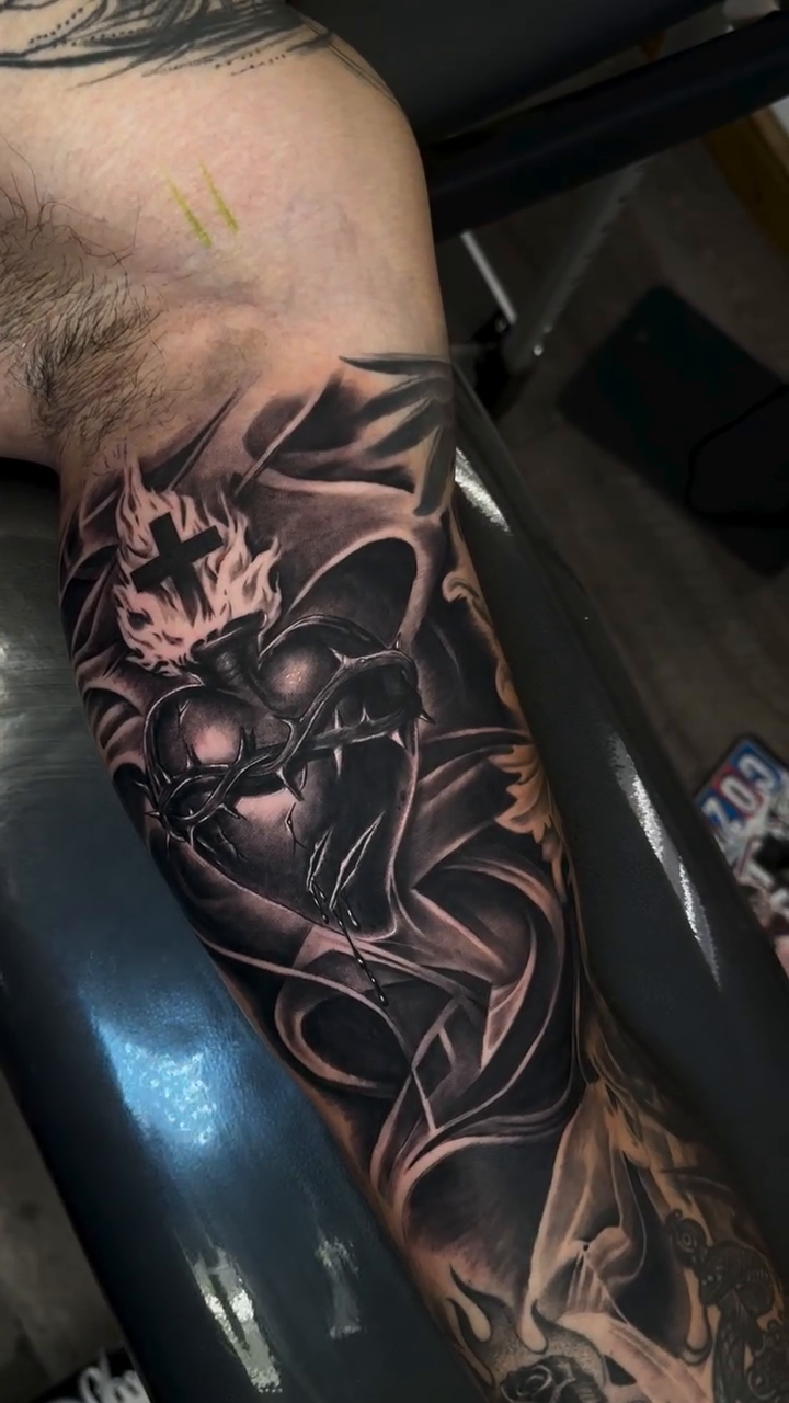 Demonic skull with flames dark realism tattoo by Tattoos By Kique