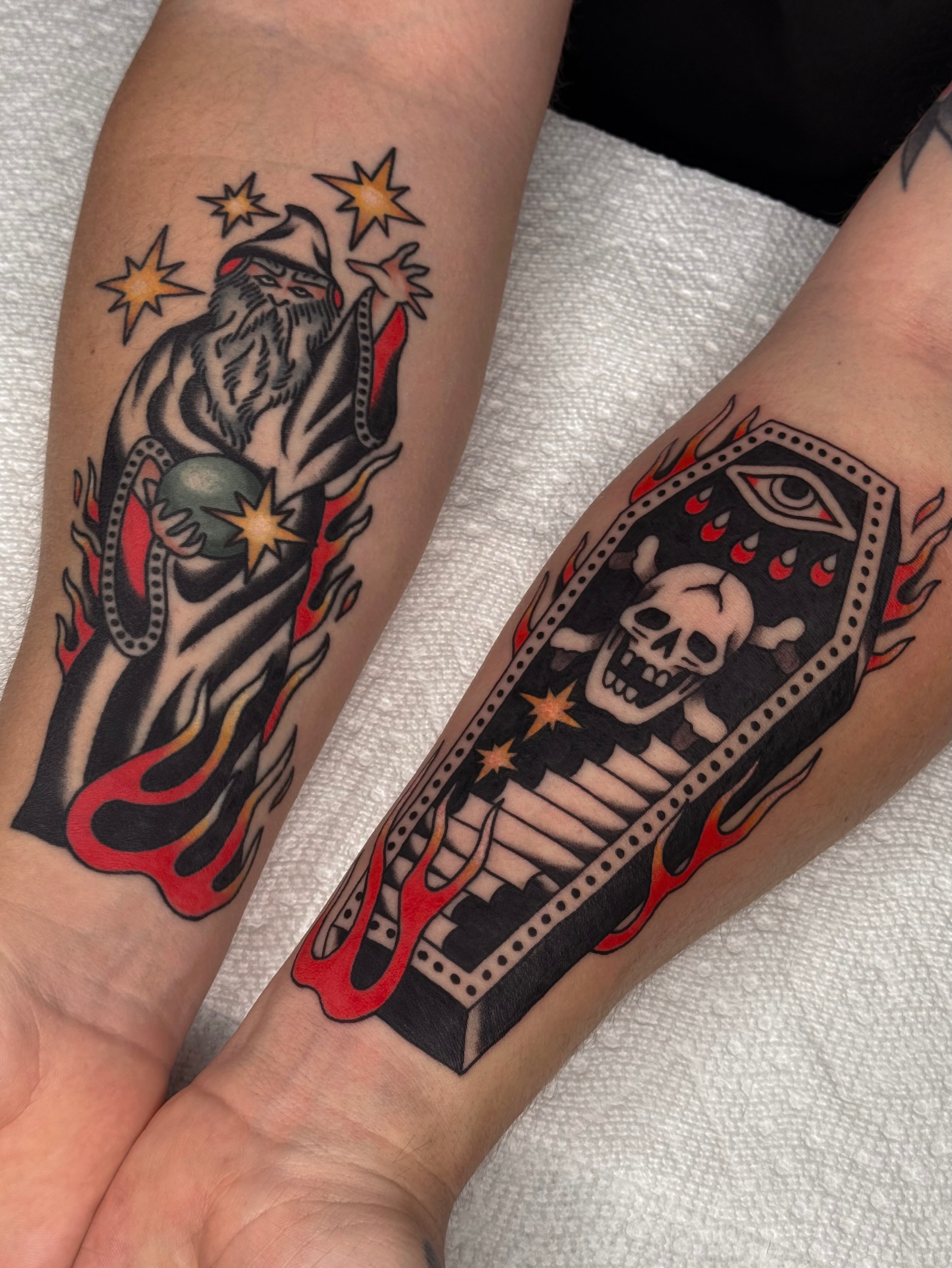 Santa Claus and coffin American traditional tattoo on the forearm by Bridgette Carberry