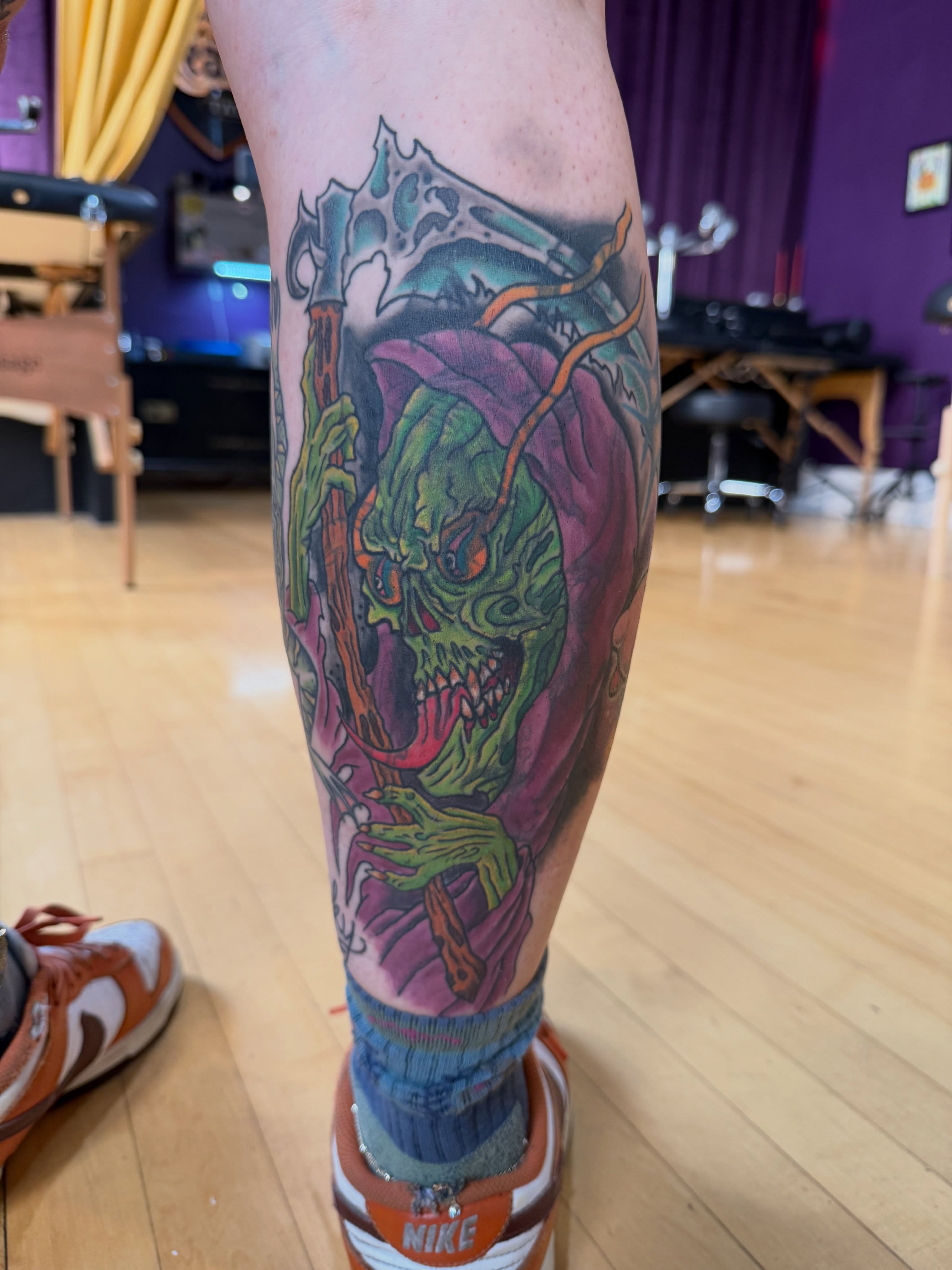 Zombie dotwork tattoo on the calf by Trevor Berry