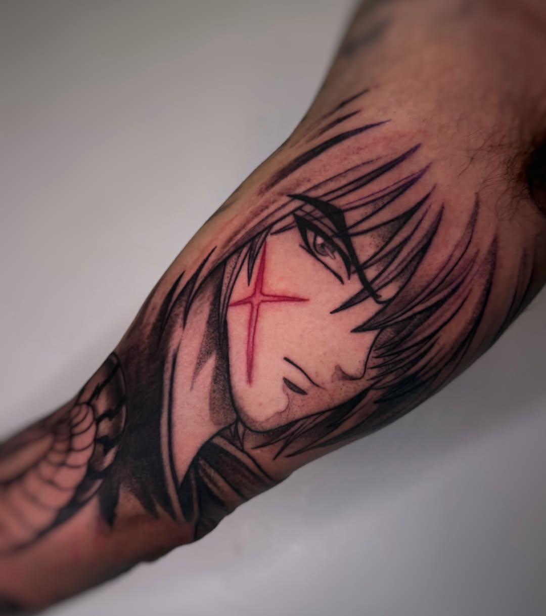 Anime character anime tattoo on the forearm by Melissa "Lotuss" Chan