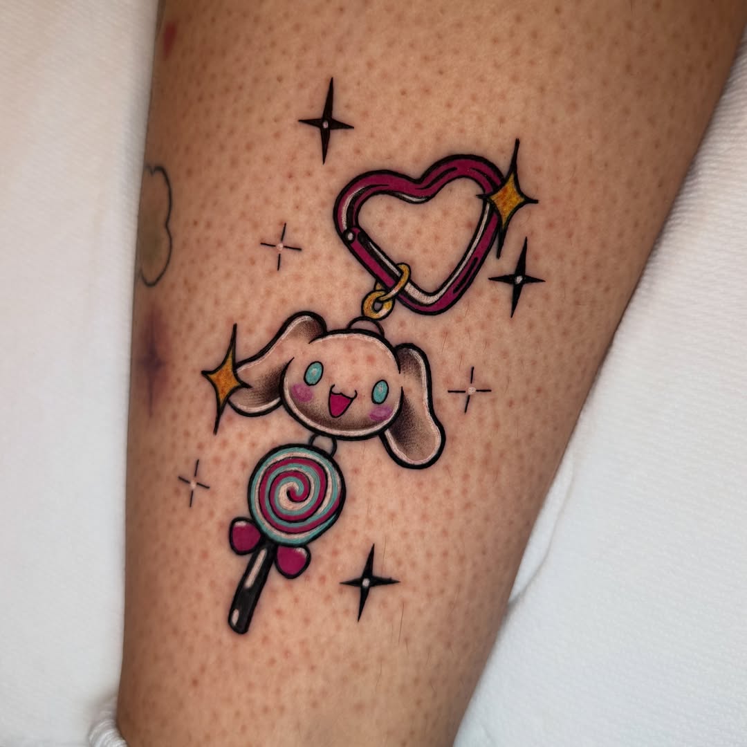 Kawaii character with lollipop new school tattoo on the forearm by Alexia