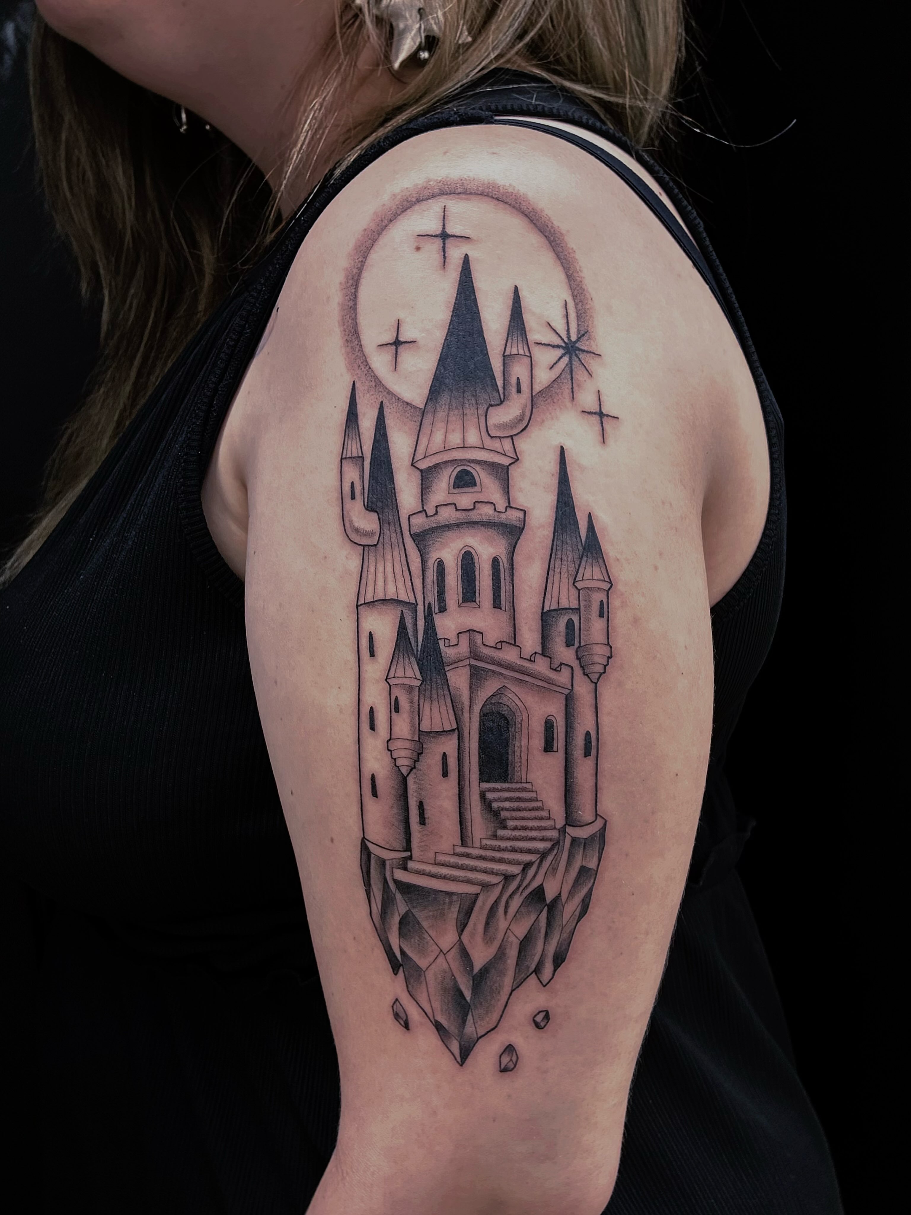 Castle black and grey tattoo on the shoulder by β
πΈππππ β
