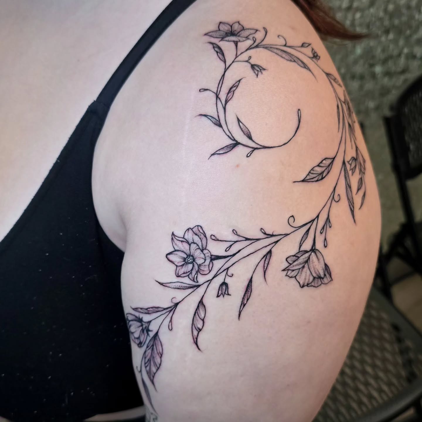 Moon and floral wreath fine line tattoo on the shoulder by Hope 🌙, Cincinnati