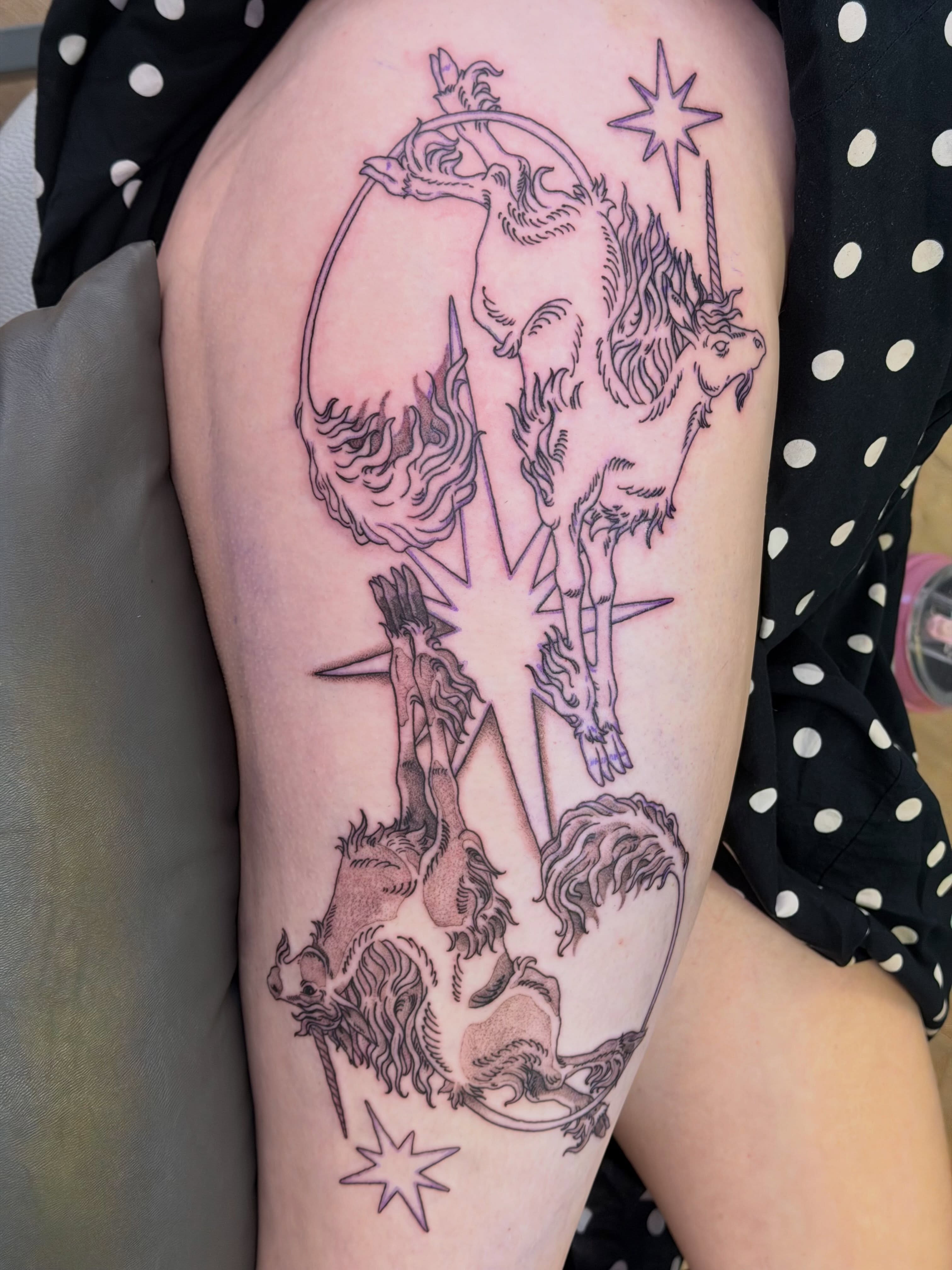 Unicorns and stars black and grey tattoo on the thigh by Stvn Geyer, Urbandale, Iowa