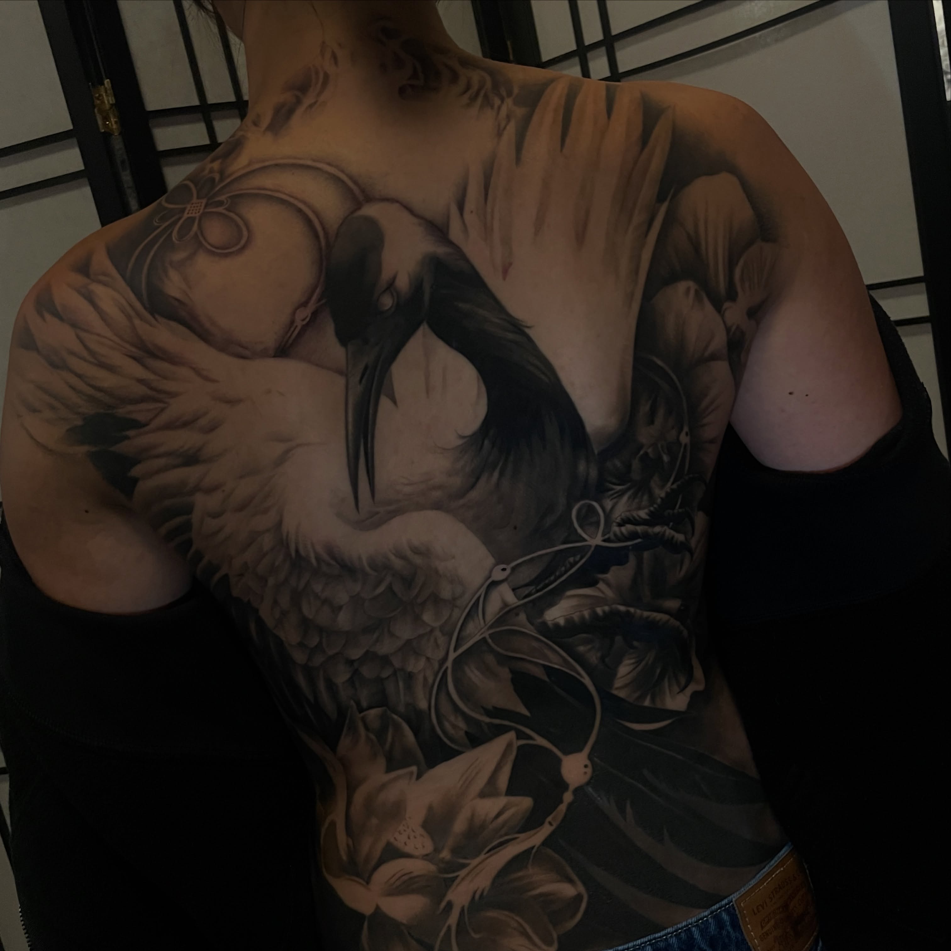 Stork and lotus realism tattoo on the chest by ✨tiffy ✨