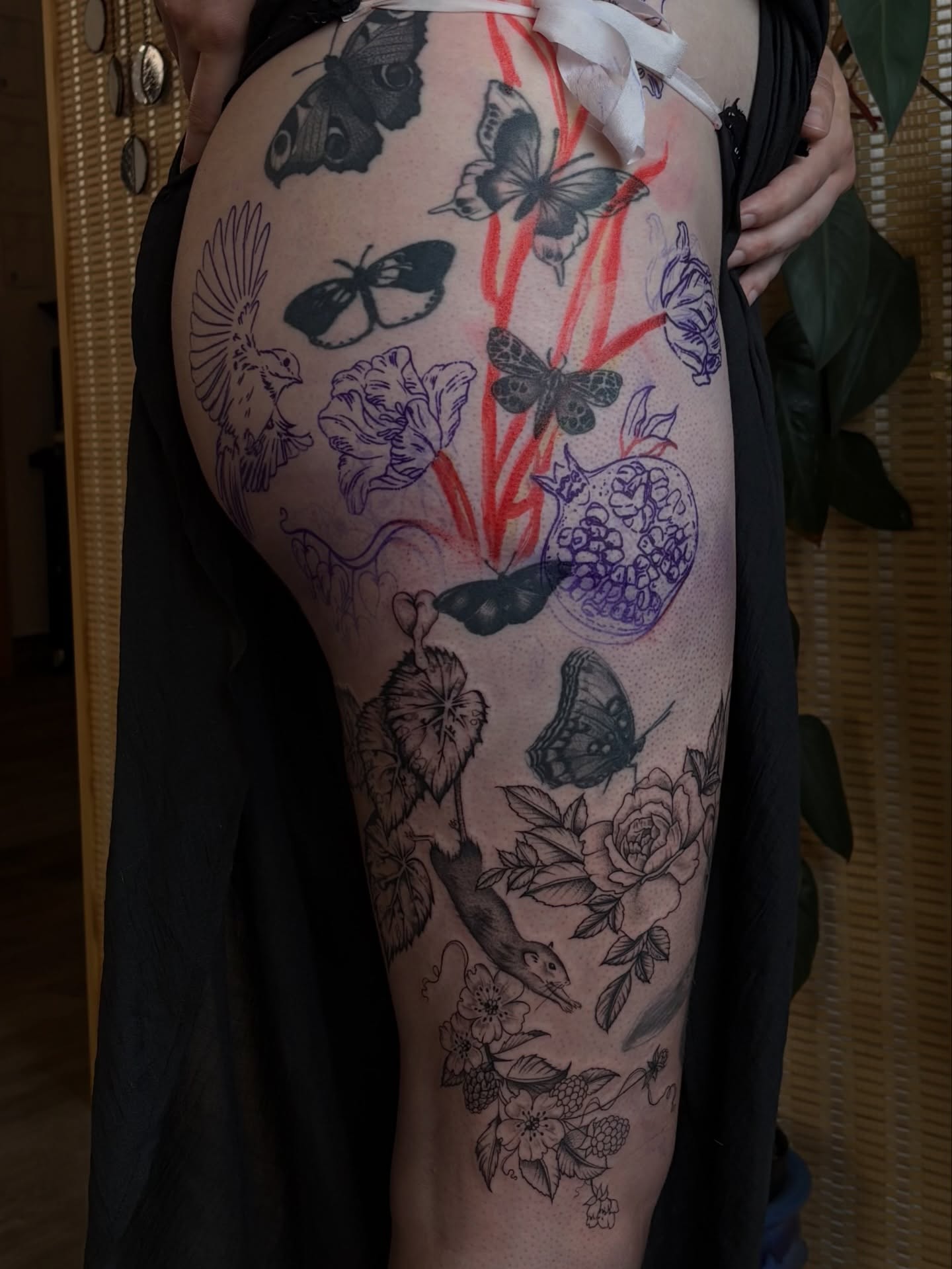 Floral and butterfly black and grey tattoo on the thigh by emery ♡ slc utah tattoo artist