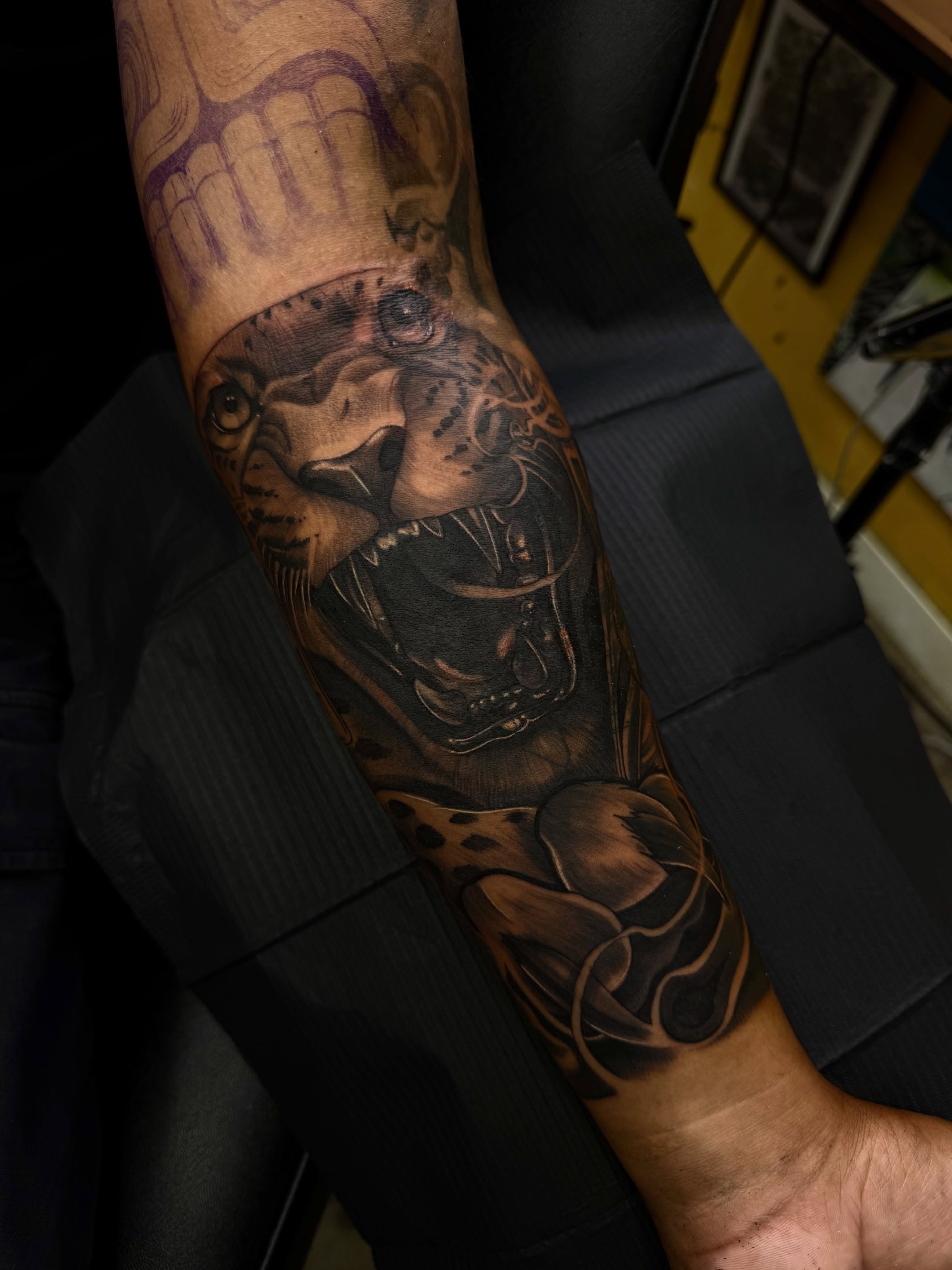 Panther realism tattoo on the forearm by San Diego Tattoo Artist