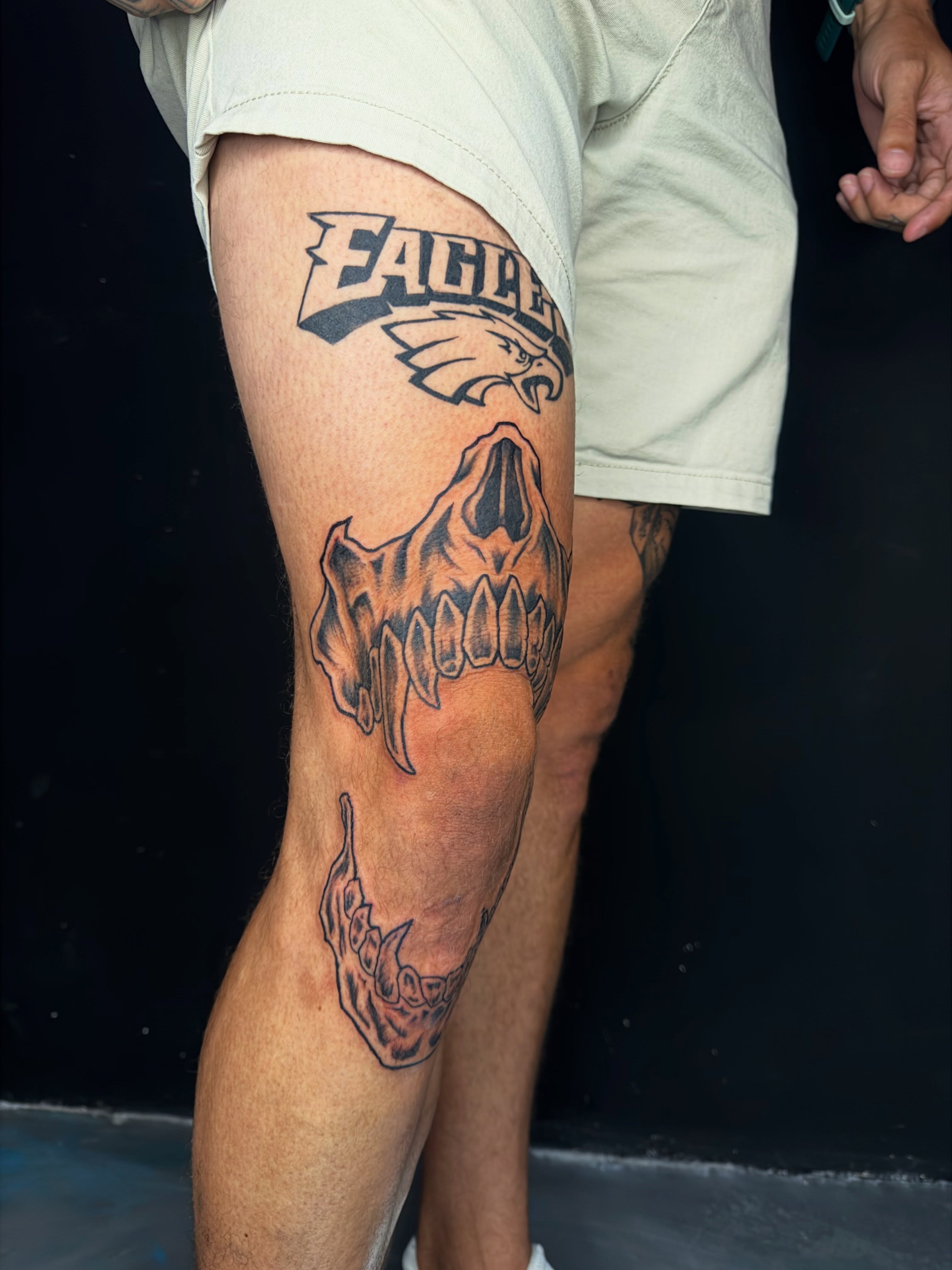 Skull black and grey tattoo on the thigh by David Yancy III