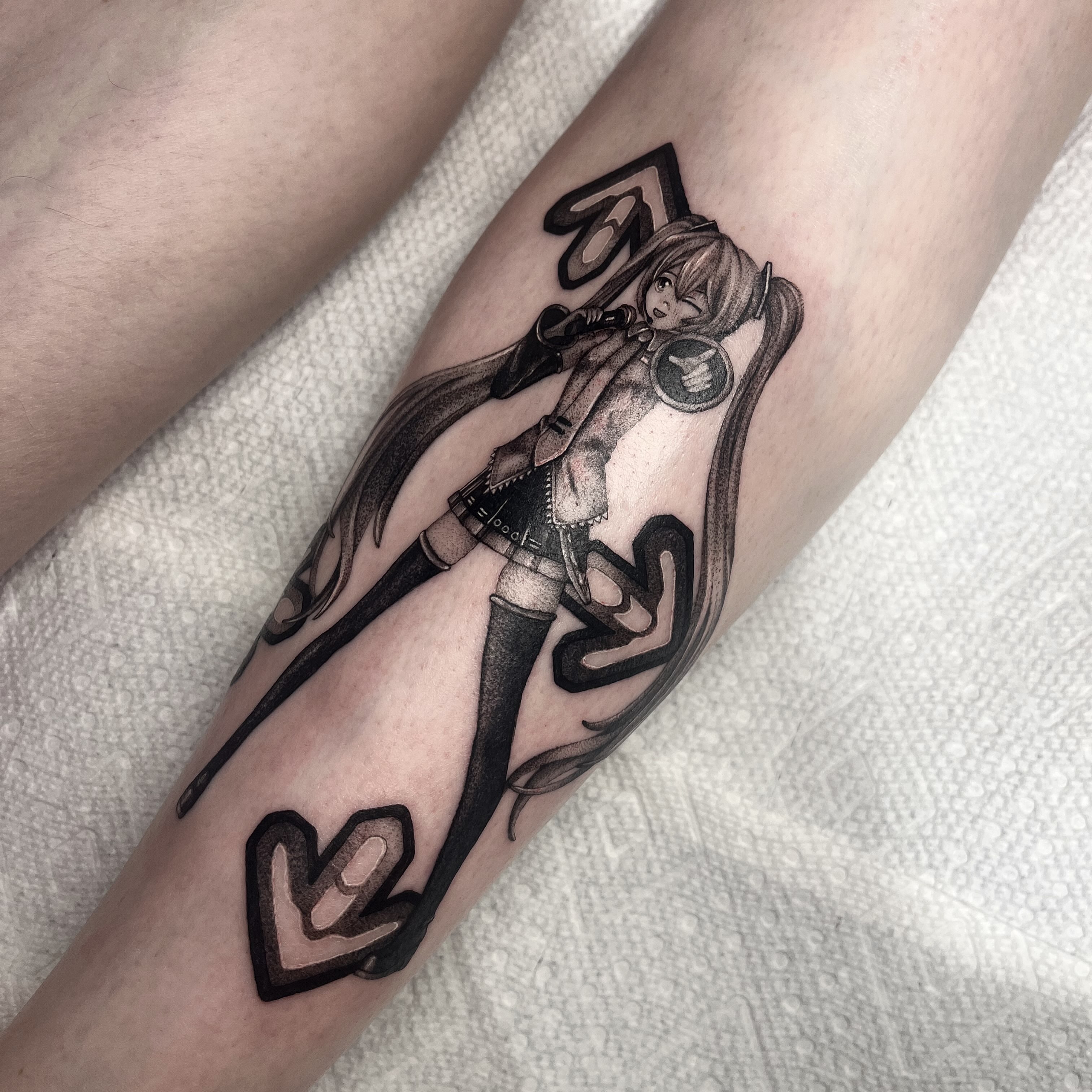 Anime character anime tattoo on the forearm by aurora