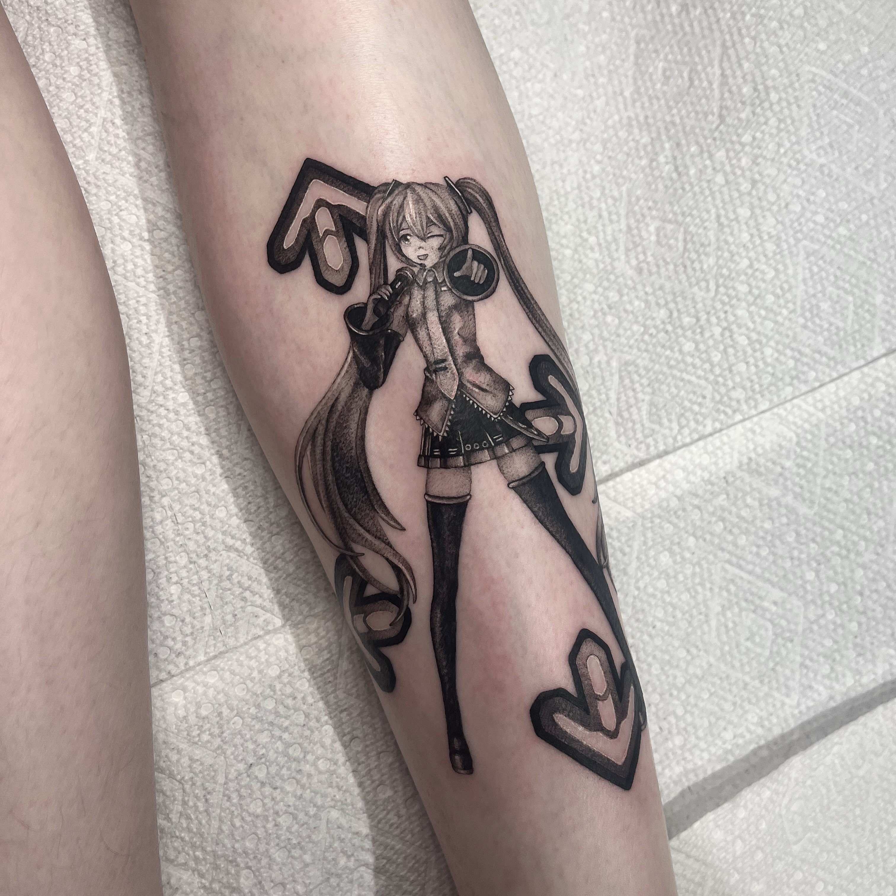 Anime character anime tattoo on the forearm by aurora