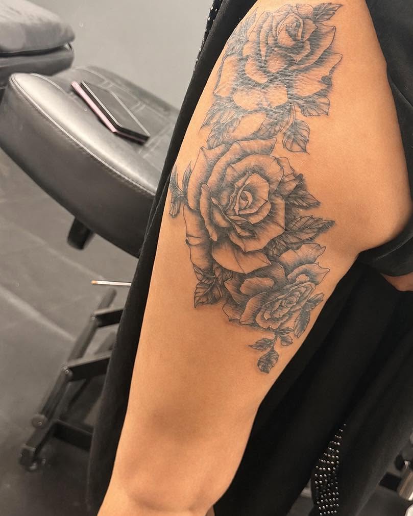 Roses black and grey tattoo on the forearm by Flamboyant