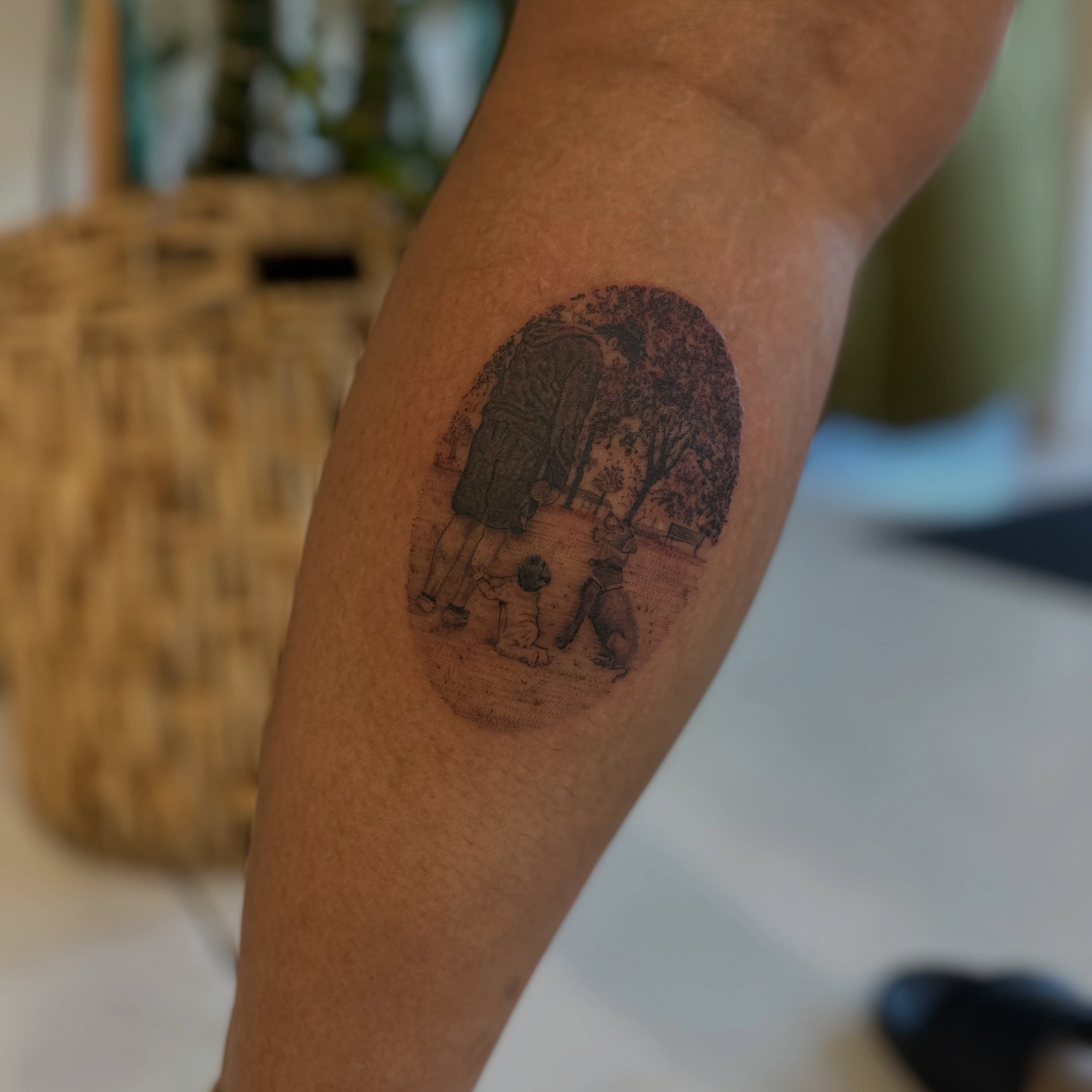 Park scene black and grey tattoo on the forearm by Ric Castellon Tattoo Artist, Los Angeles, California