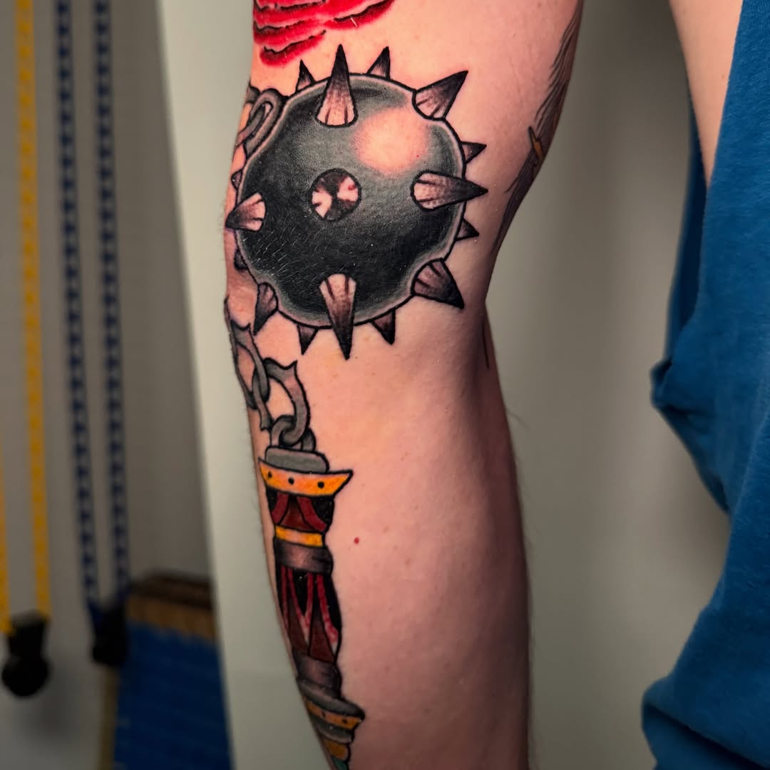 Spiked ball neo-traditional tattoo on the forearm by Zac Chaffin