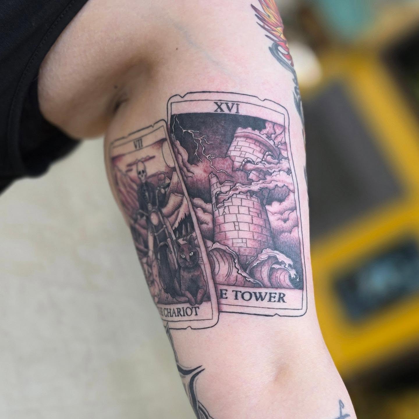 Tarot cards black and grey tattoo on the forearm by Jordanna Pearl
