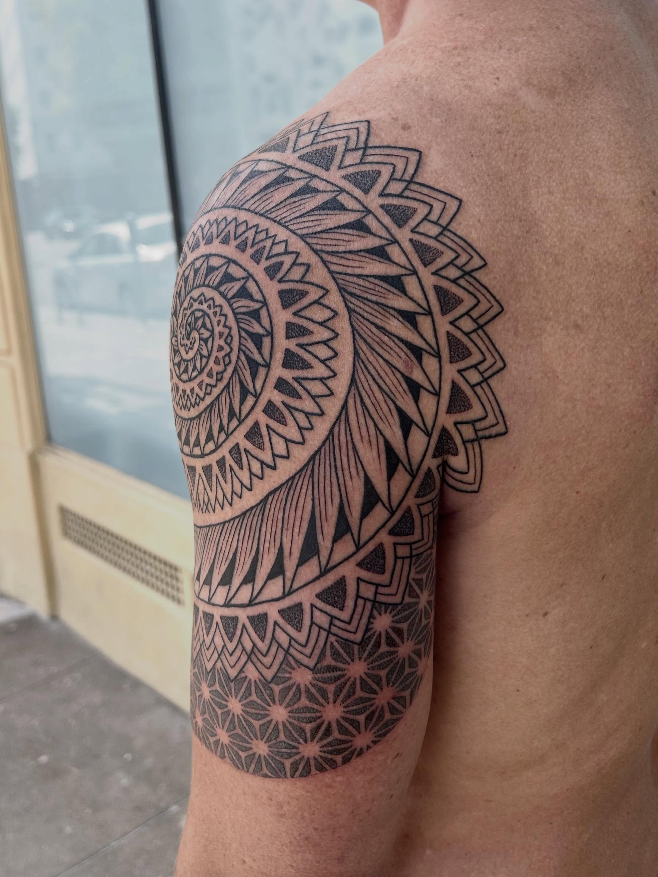 Mandala geometric tattoo on the shoulder by Ravi Chandra, Mount Shasta, California