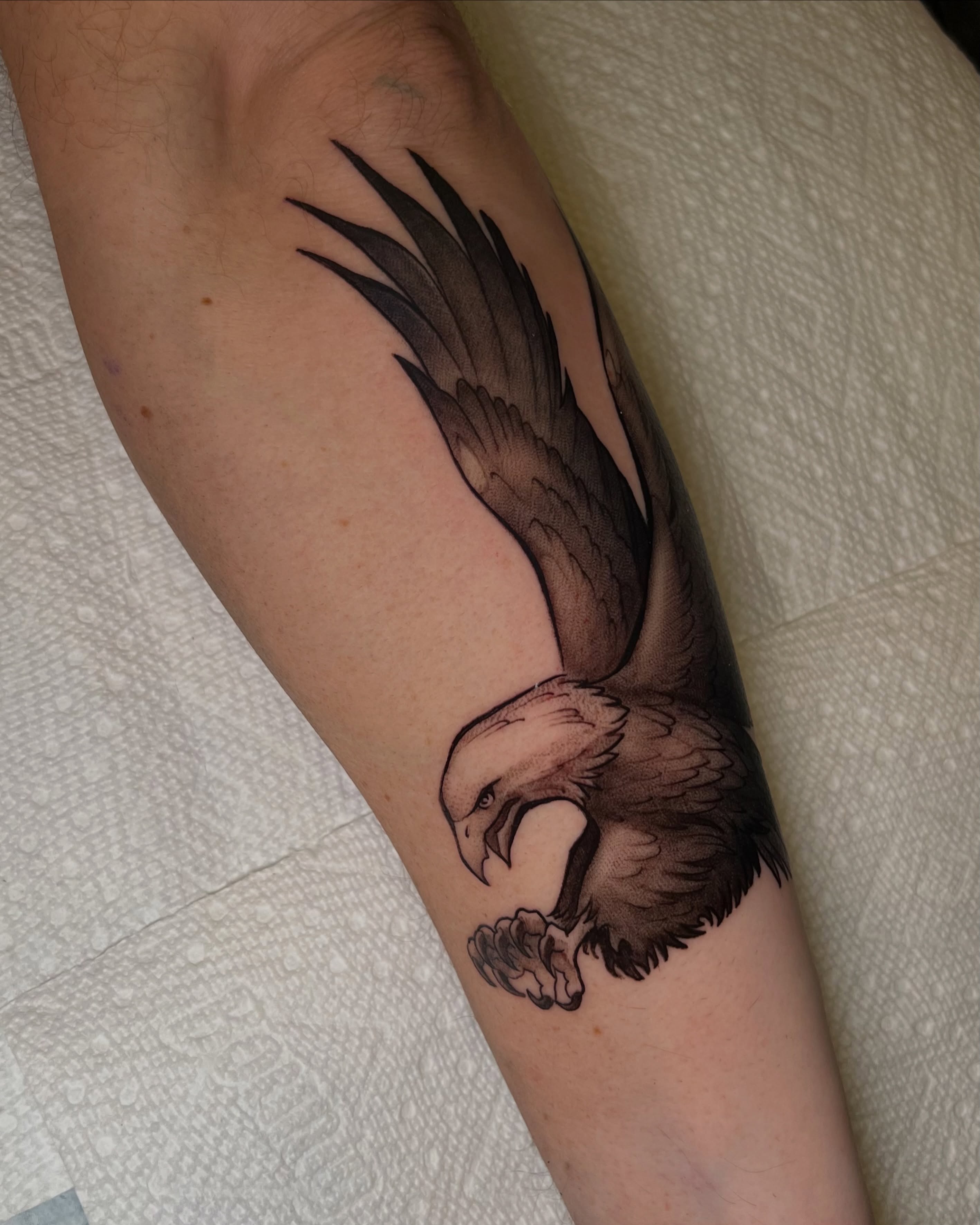 Eagle realism tattoo on the forearm by Millie, Maryville, Tennessee