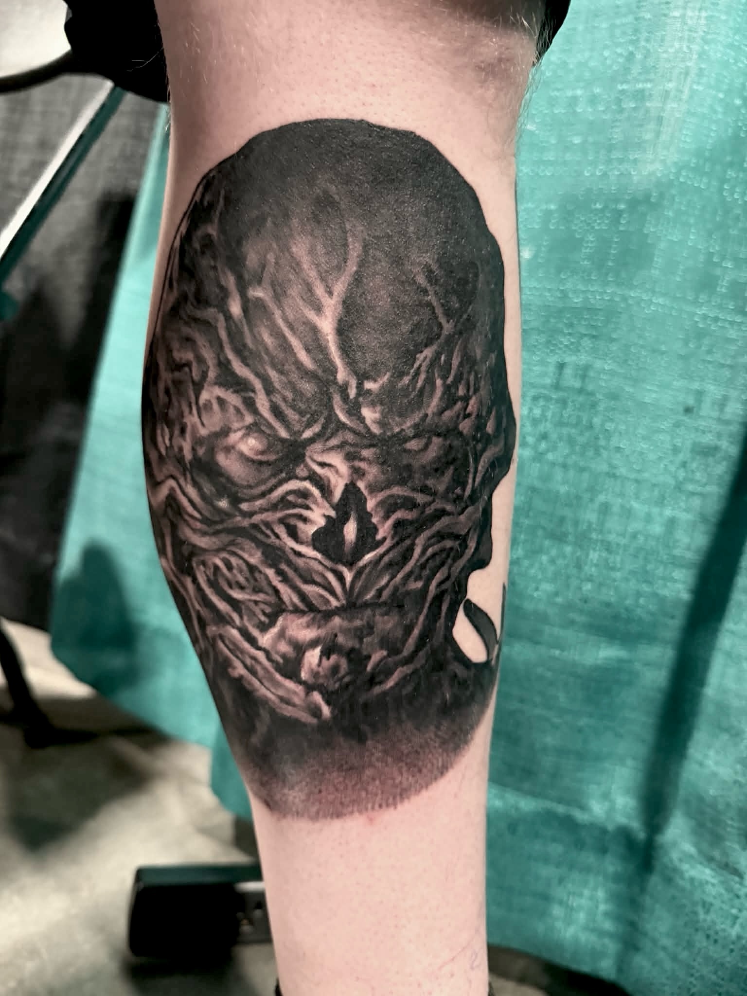 Demon face dark realism tattoo on the forearm by Josh Williams, Chattanooga, Tennessee