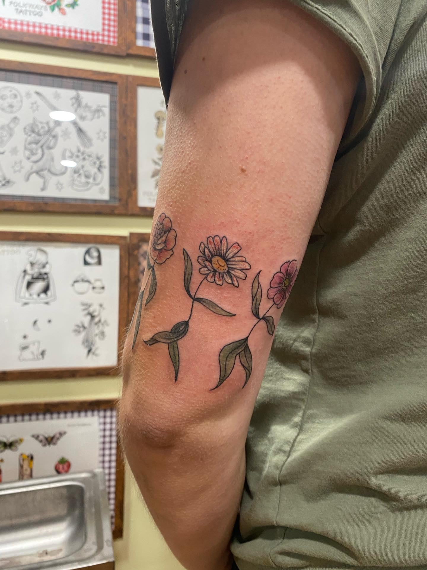 Flowers realism tattoo on the forearm by adrienne mae ❀