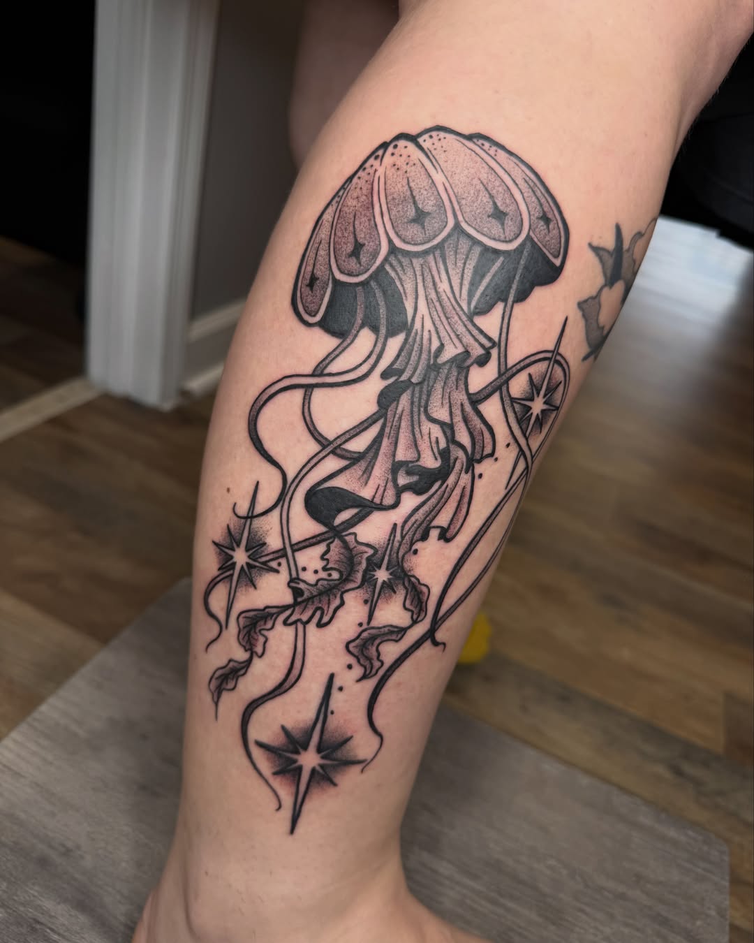 Jellyfish dotwork tattoo on the forearm by Jezza Munson